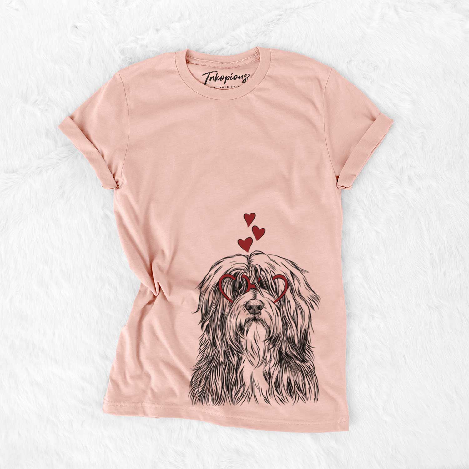 Hand-drawn sketch of Otto the Polish Lowland Sheepdog wearing heart-shaped glasses on a Peach Bella Canvas Unisex Crewneck