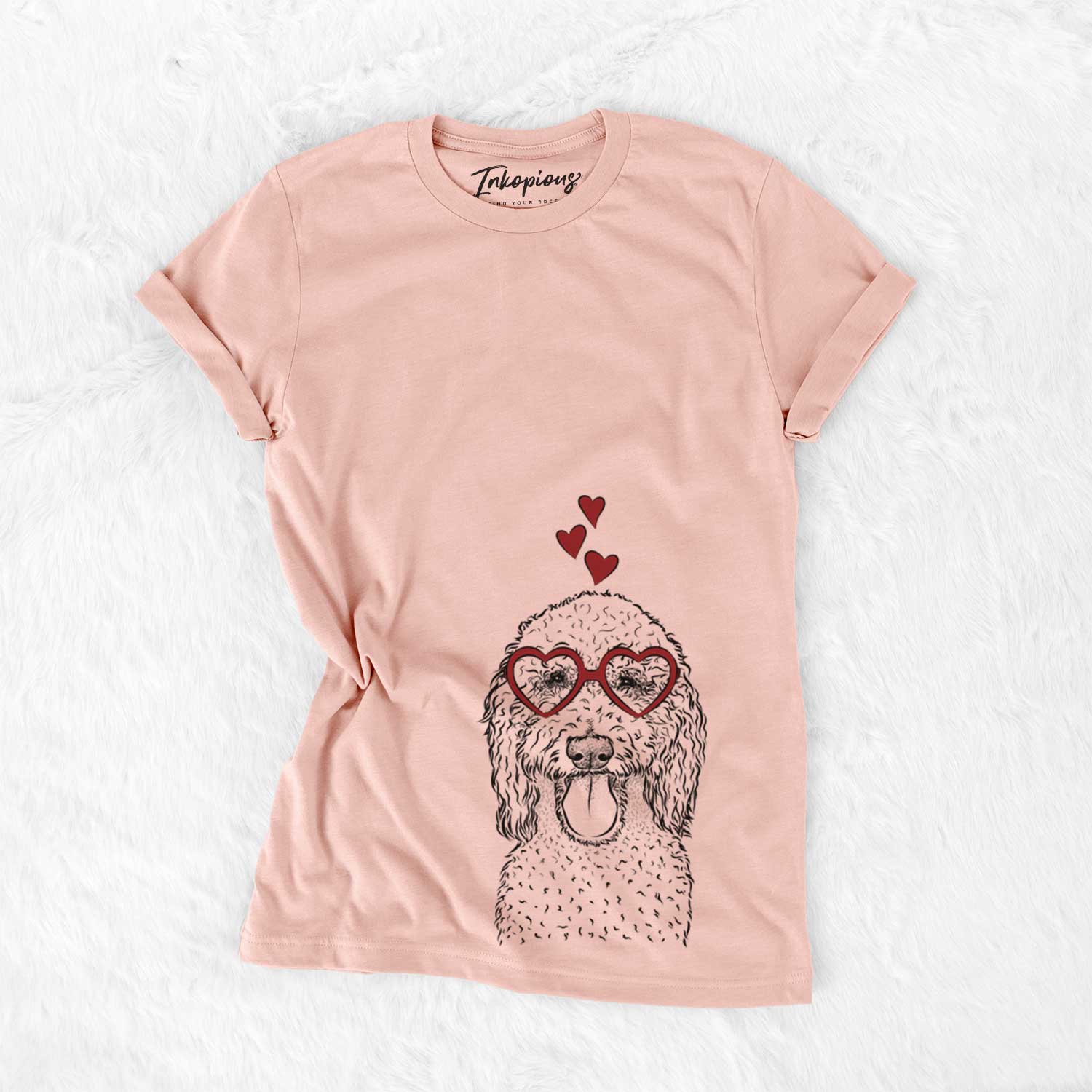 Hand-drawn sketch of Pavlov the Goldendoodle wearing heart-shaped glasses on a Peach Bella Canvas Unisex Crewneck