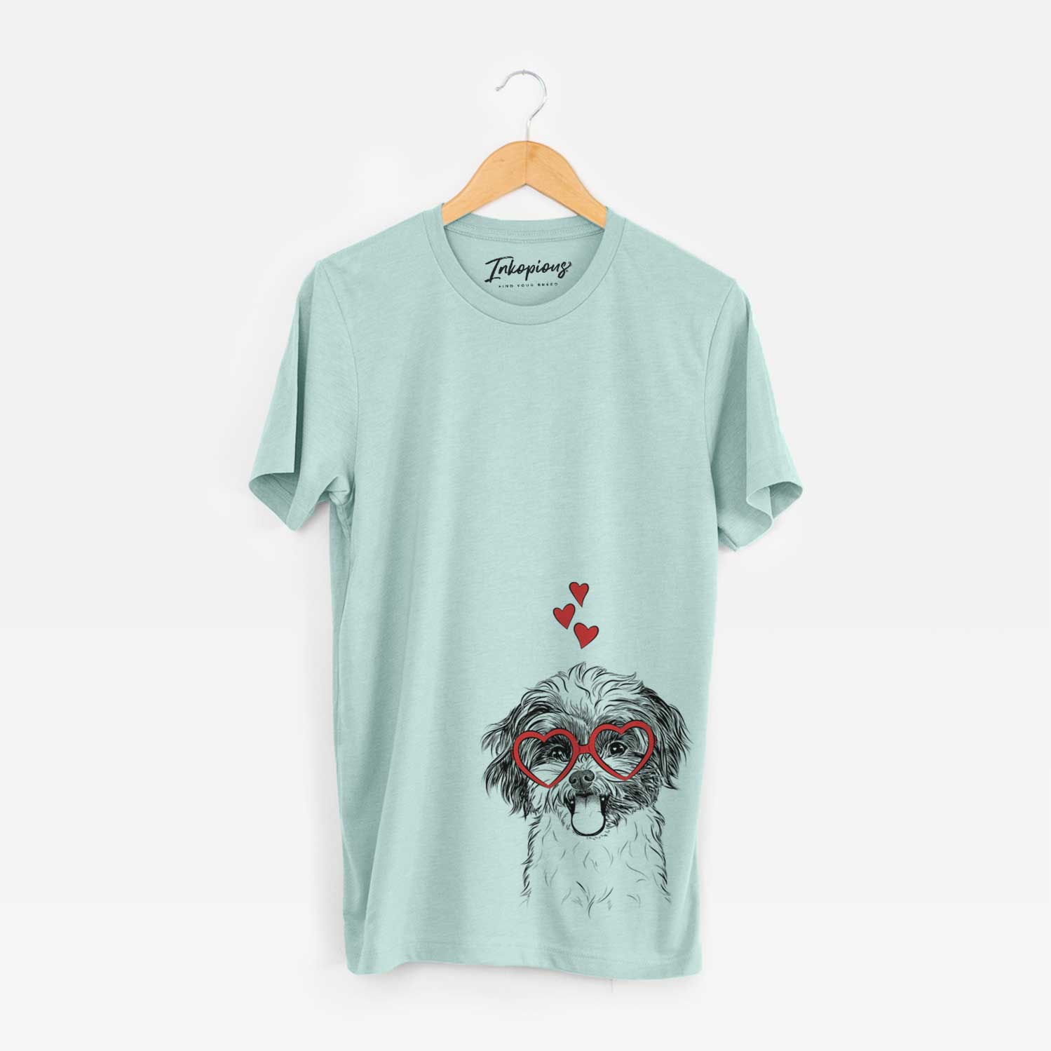 Hand-drawn sketch of Pepper the Shihpoo wearing heart-shaped glasses on a Heather Sage Bella Canvas Unisex Crewneck