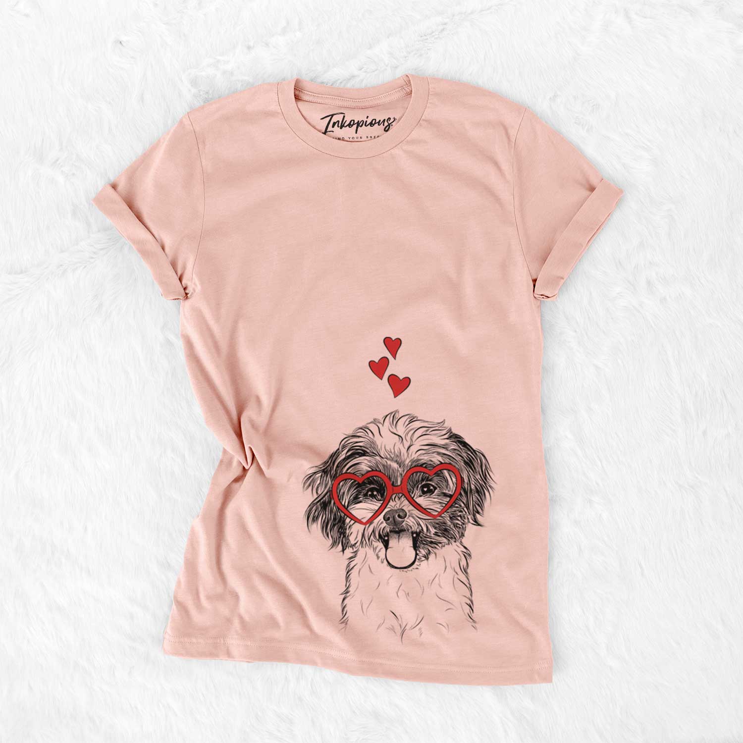 Hand-drawn sketch of Pepper the Shihpoo wearing heart-shaped glasses on a Peach Bella Canvas Unisex Crewneck