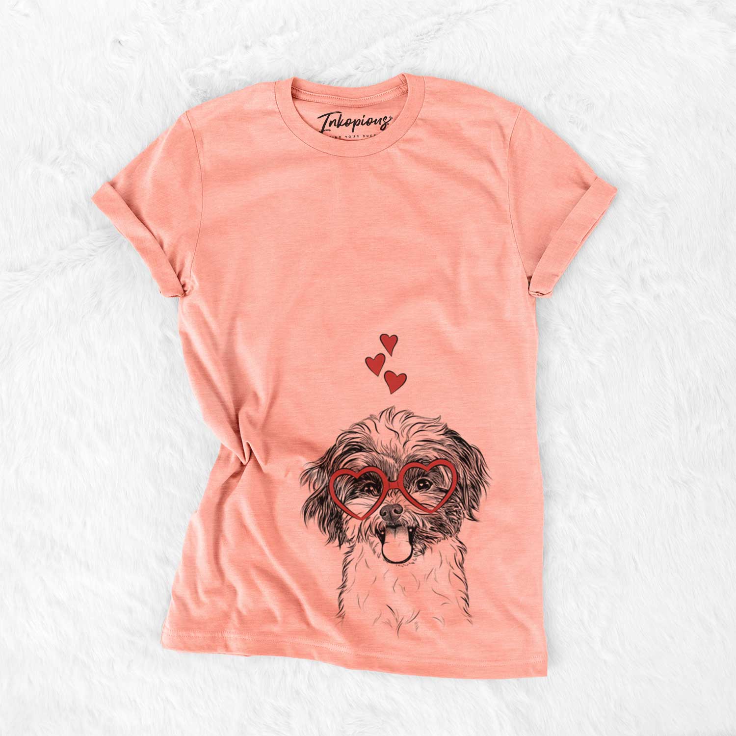 Hand-drawn sketch of Pepper the Shihpoo wearing heart-shaped glasses on a Sunset Bella Canvas Unisex Crewneck