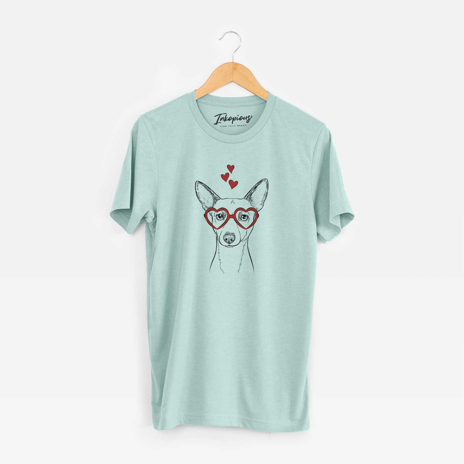 Hand-drawn sketch of Perry the Portuguese Podengo wearing heart-shaped glasses on a Heather Sage Unisex crewneck