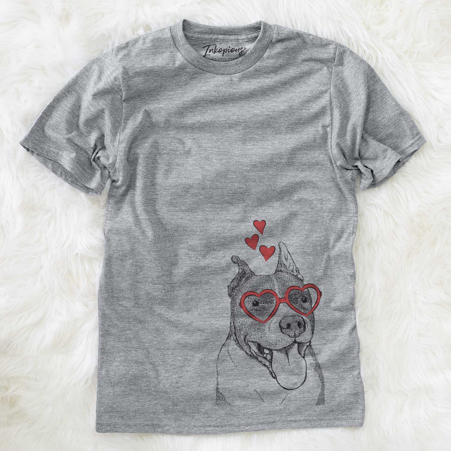 Hand-drawn sketch of Piggy the American Staffordshire Terrier wearing heart-shaped glasses on a Grey Unisex crewneck