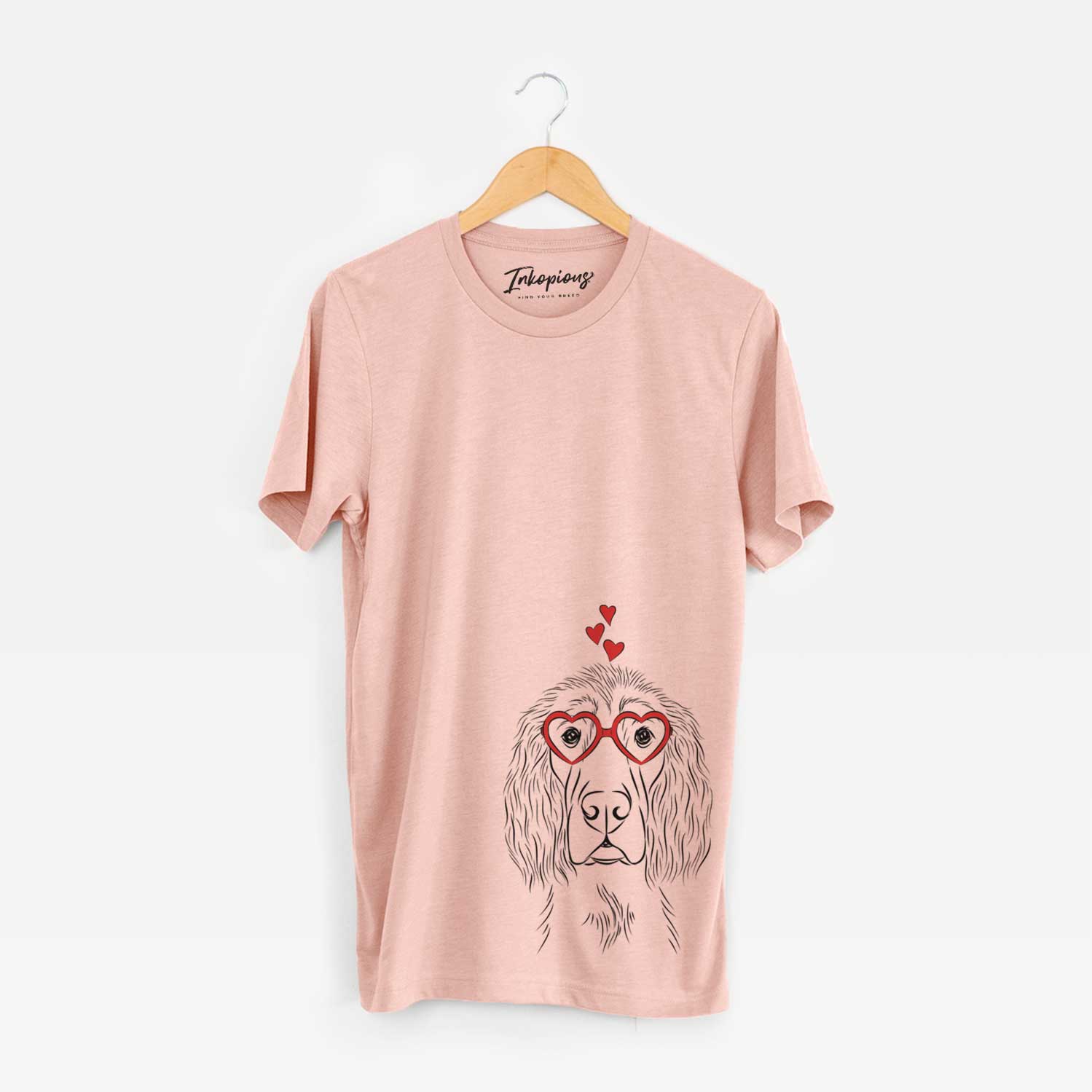 Hand-drawn sketch of Piper the Irish Setter wearing heart-shaped glasses on a Peach Unisex crewneck