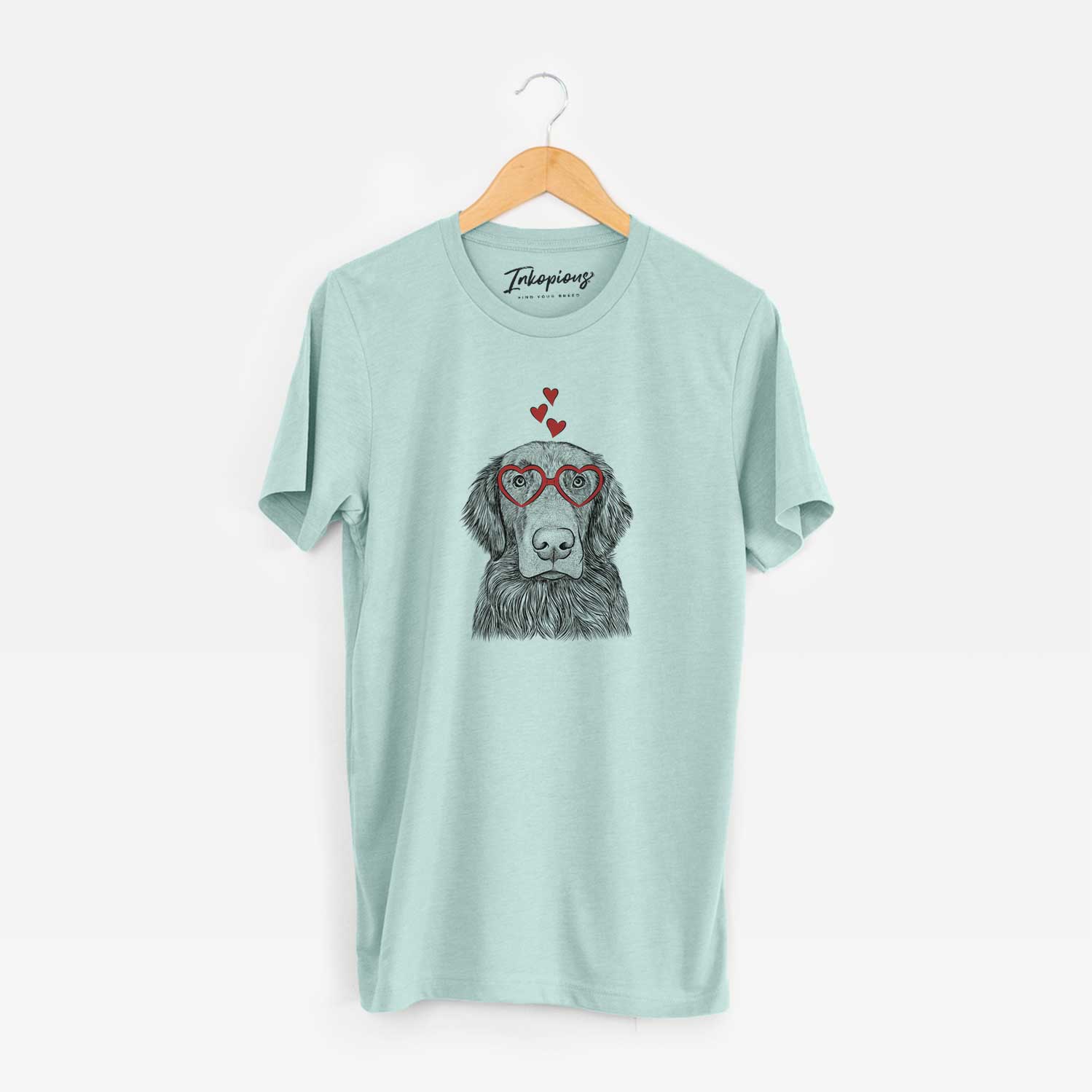 Hand-drawn sketch of Pippin the Flat Coated Retriever wearing heart-shaped glasses on a Heather Sage Unisex crewneck