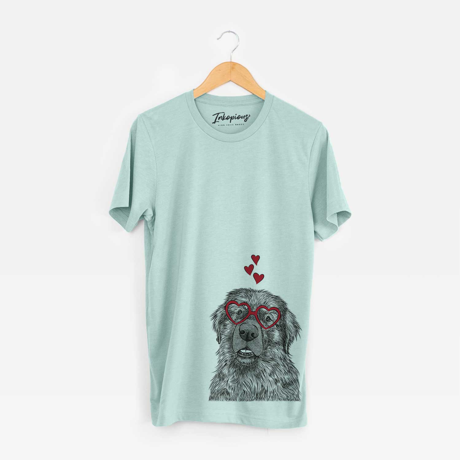 Hand-drawn sketch of Ralph the Leonberger wearing heart-shaped glasses on a Heather Sage Bella Canvas Unisex Crewneck