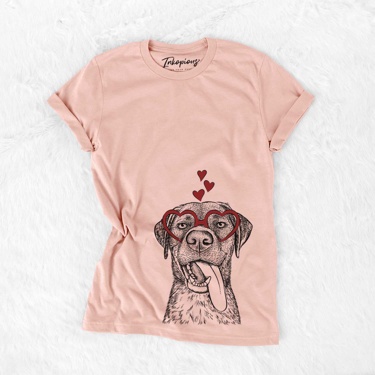 Hand-drawn sketch of Reese the Mixed Breed wearing heart-shaped glasses on a Peach Bella Canvas Unisex Crewneck