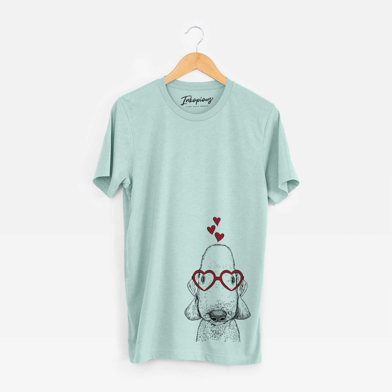 Hand-drawn sketch of Remington the Bedlington Terrier wearing heart-shaped glasses on a Heather Sage Bella Canvas Unisex Crewneck