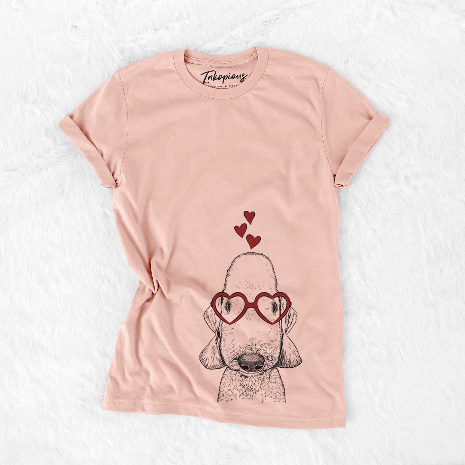 Hand-drawn sketch of Remington the Bedlington Terrier wearing heart-shaped glasses on a Peach Bella Canvas Unisex Crewneck