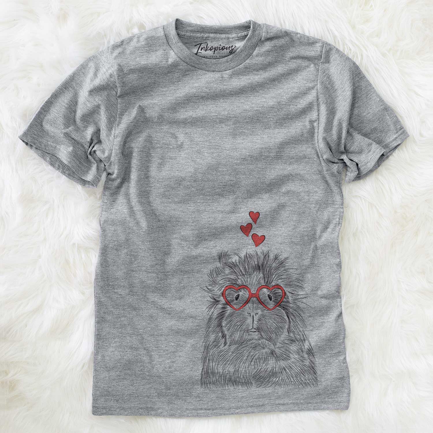 Hand-drawn sketch of Rhino the Guinea Pig wearing heart-shaped glasses on a Grey Unisex crewneck