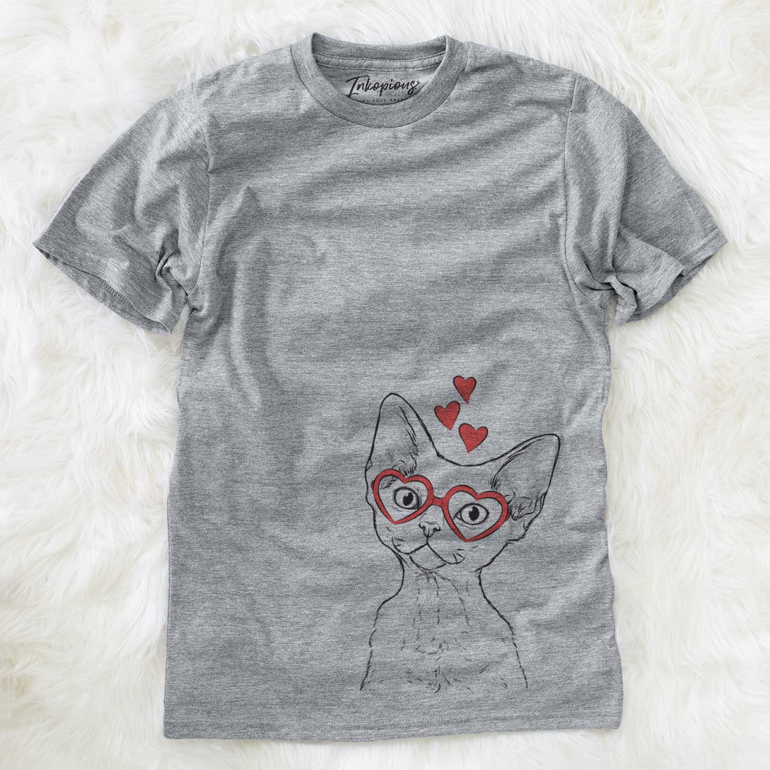 Hand-drawn sketch of Ripley the Devon Rex Cat wearing heart-shaped glasses on a Grey Unisex crewneck