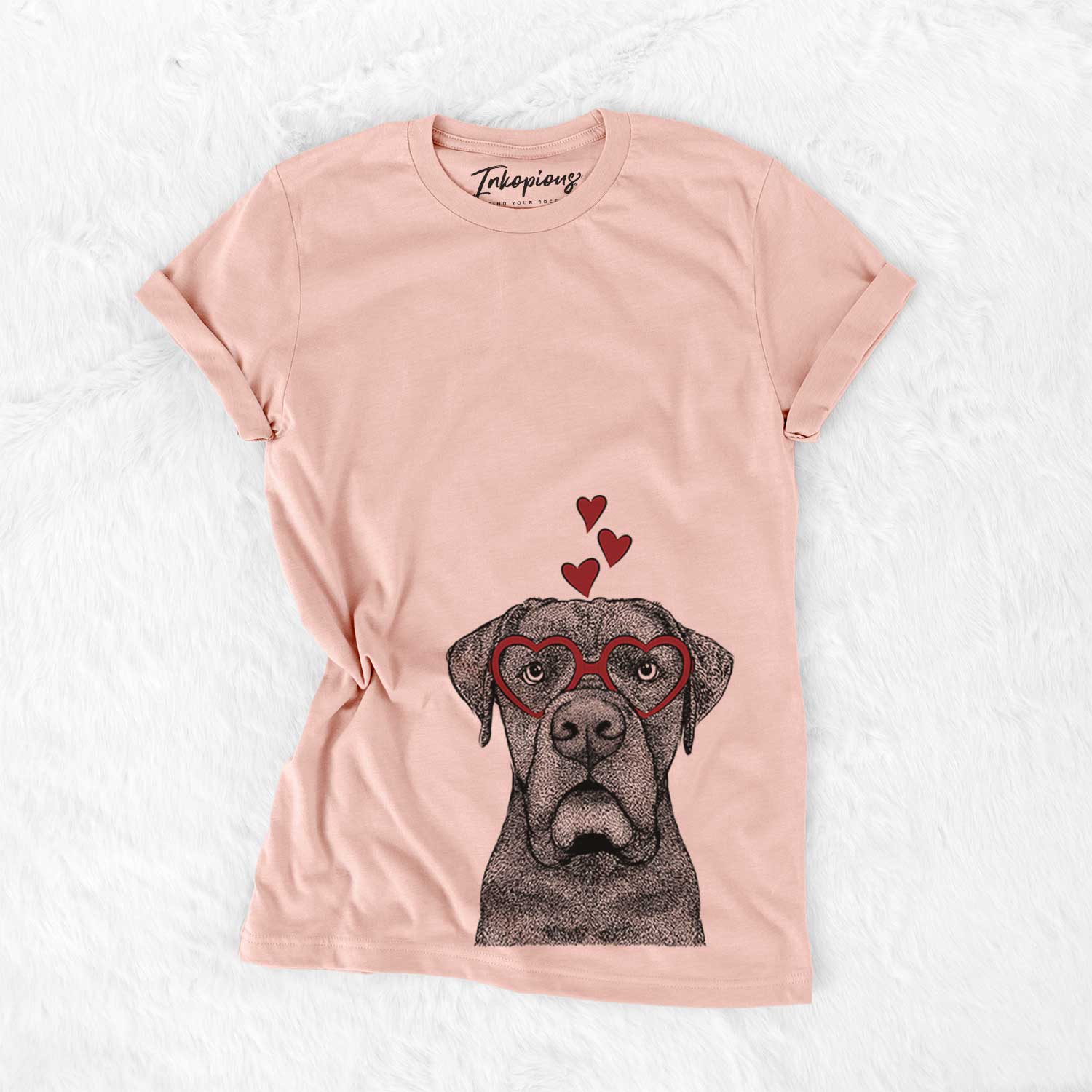 Hand-drawn sketch of Rocco the Cane Corso wearing heart-shaped glasses on a Peach Bella Canvas Unisex Crewneck