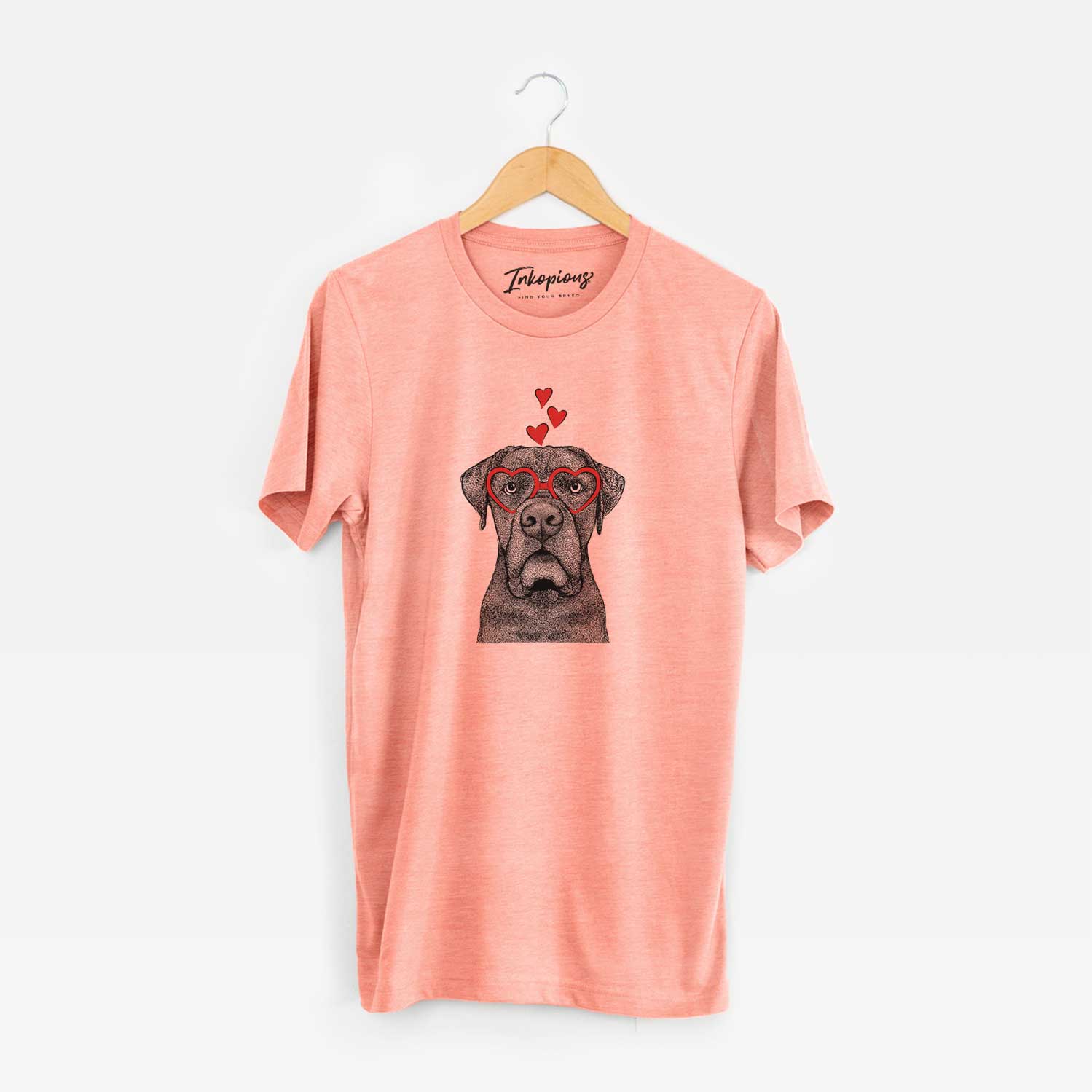 Hand-drawn sketch of Rocco the Cane Corso wearing heart-shaped glasses on a Sunset Unisex crewneck