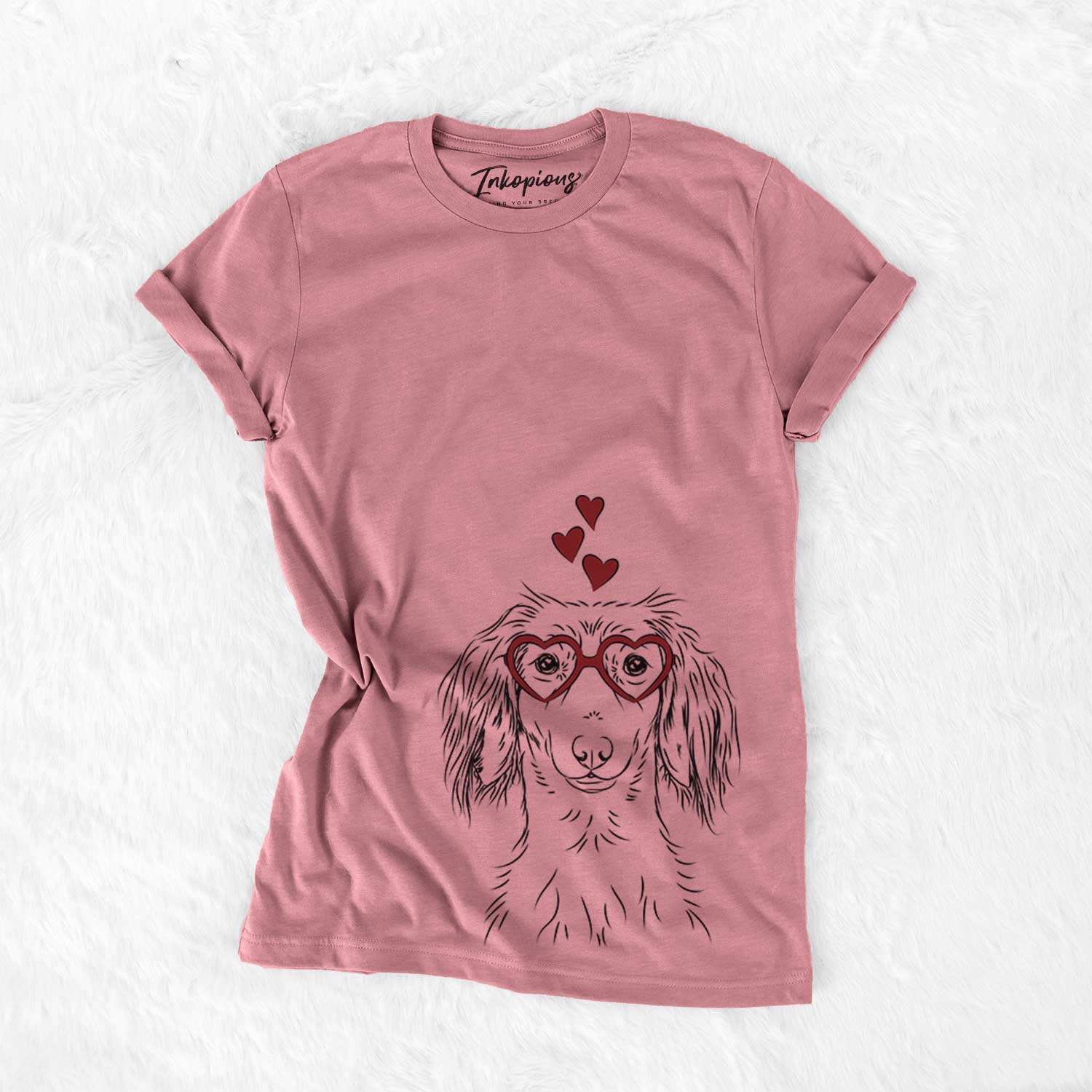 Hand-drawn sketch of Roux the Long Haired Dachshund wearing heart-shaped glasses on a Mauve Bella Canvas Unisex Crewneck