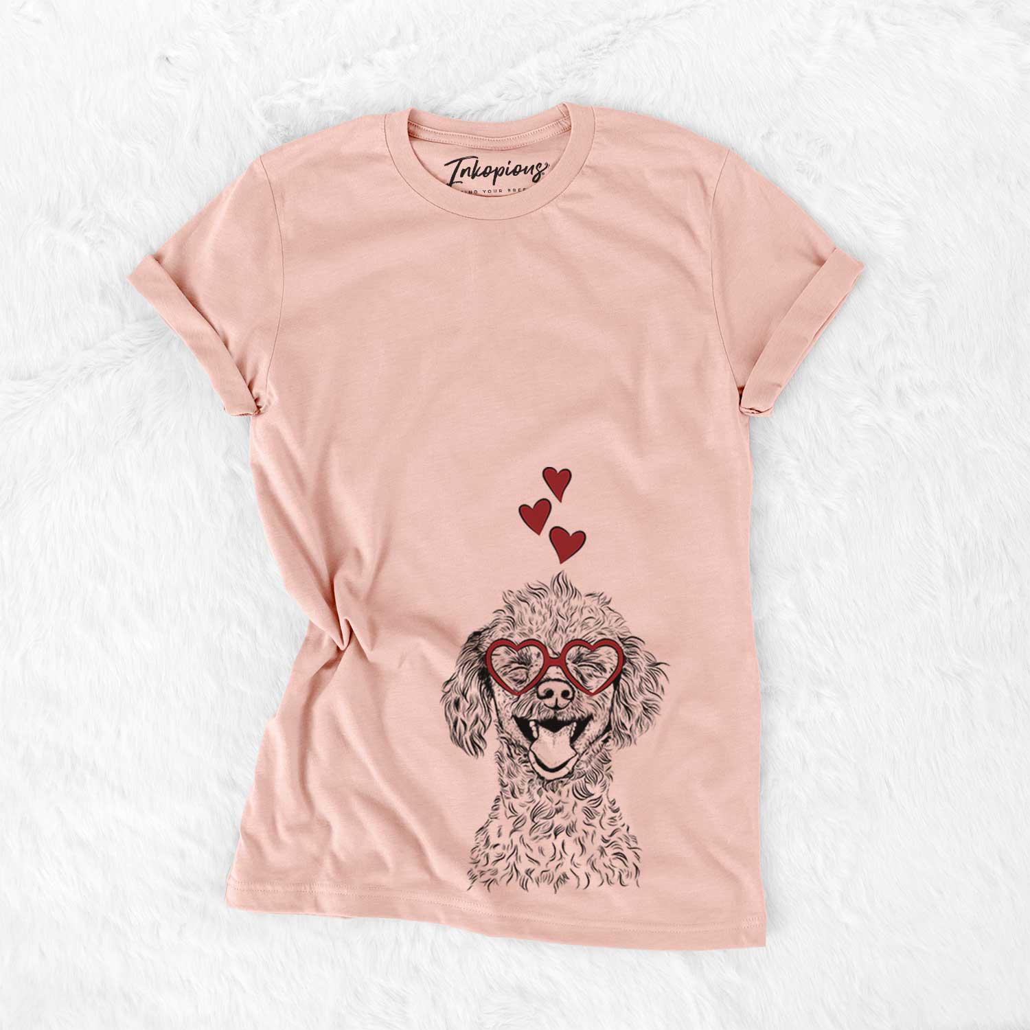 Hand-drawn sketch of Rusty the Toy Poodle wearing heart-shaped glasses on a Peach Bella Canvas Unisex Crewneck