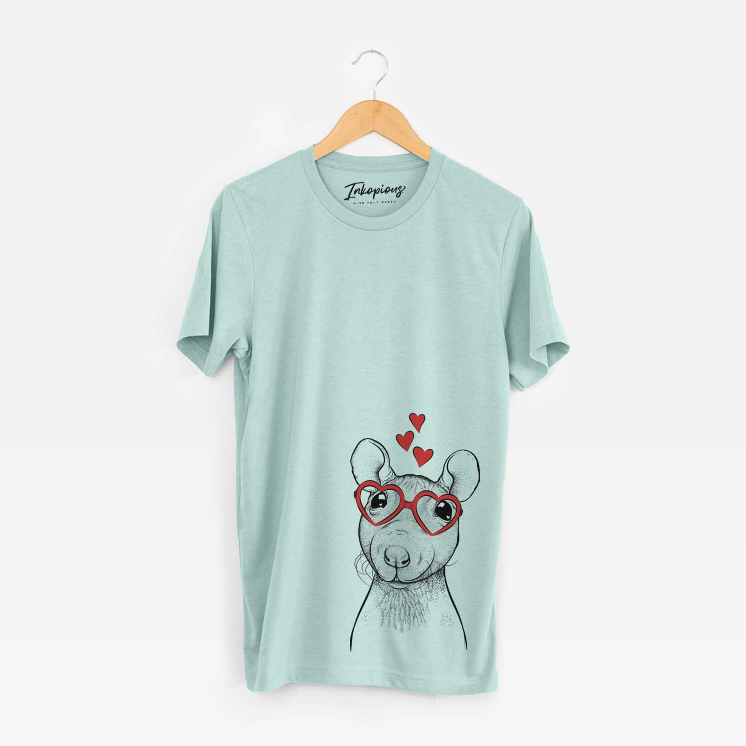 Hand-drawn sketch of Ruthie the Hairless Rat wearing heart-shaped glasses on a Heather Sage Unisex crewneck