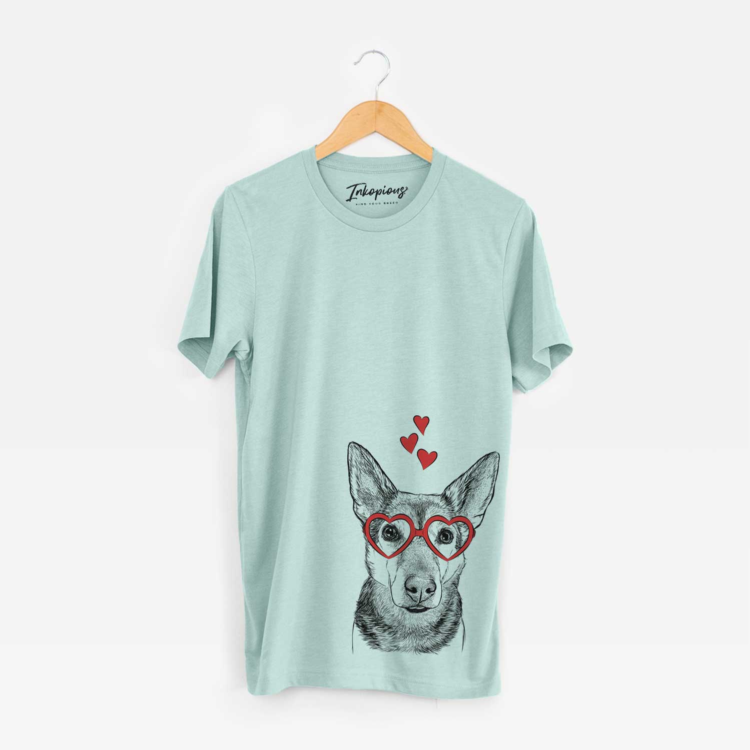 Hand-drawn sketch of Sammie the Mixed Breed wearing heart-shaped glasses on a Heather Sage Unisex crewneck