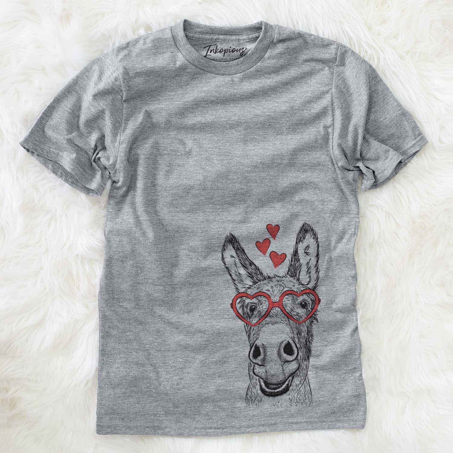 Hand-drawn sketch of Samule the Donkey wearing heart-shaped glasses on a Grey Unisex crewneck
