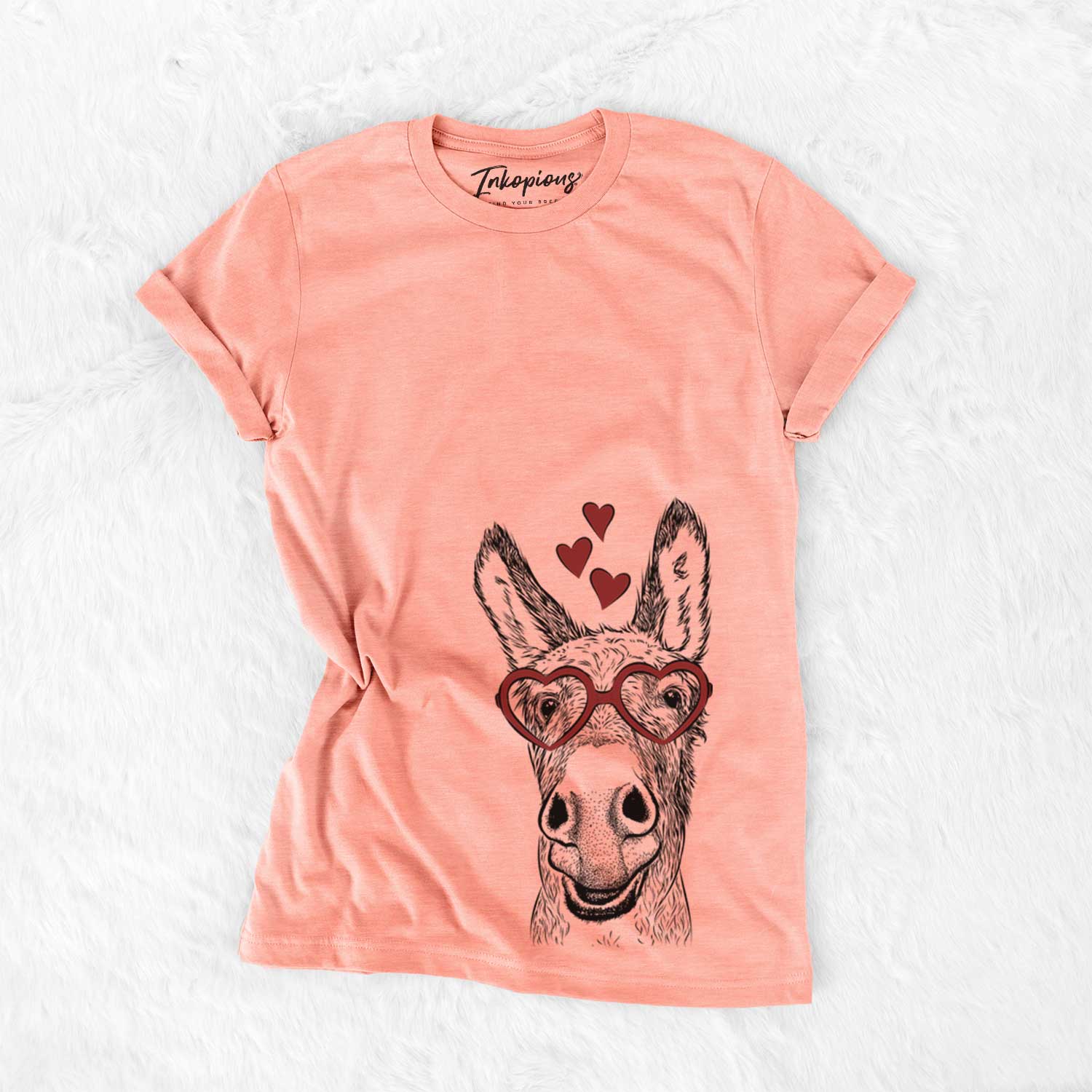Hand-drawn sketch of Samule the Donkey wearing heart-shaped glasses on a Sunset Bella Canvas Unisex Crewneck