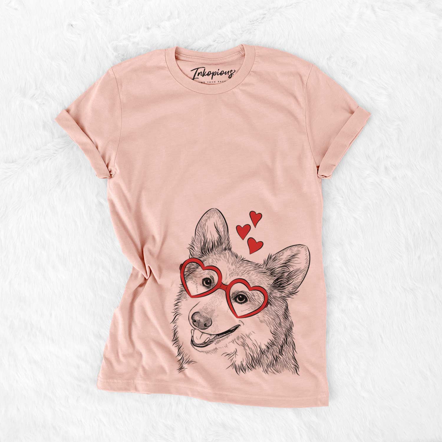 Hand-drawn sketch of Scout the Pembroke Welsh Corgi wearing heart-shaped glasses on a Peach Bella Canvas Unisex Crewneck