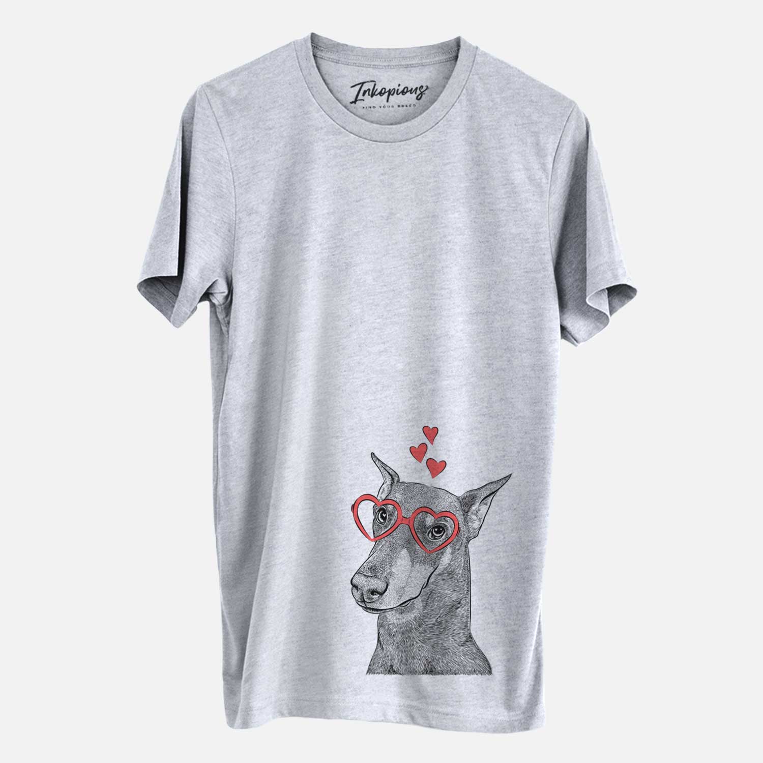 Hand-drawn sketch of Shelby the Doberman Pinscher wearing heart-shaped glasses on a Grey Unisex crewneck