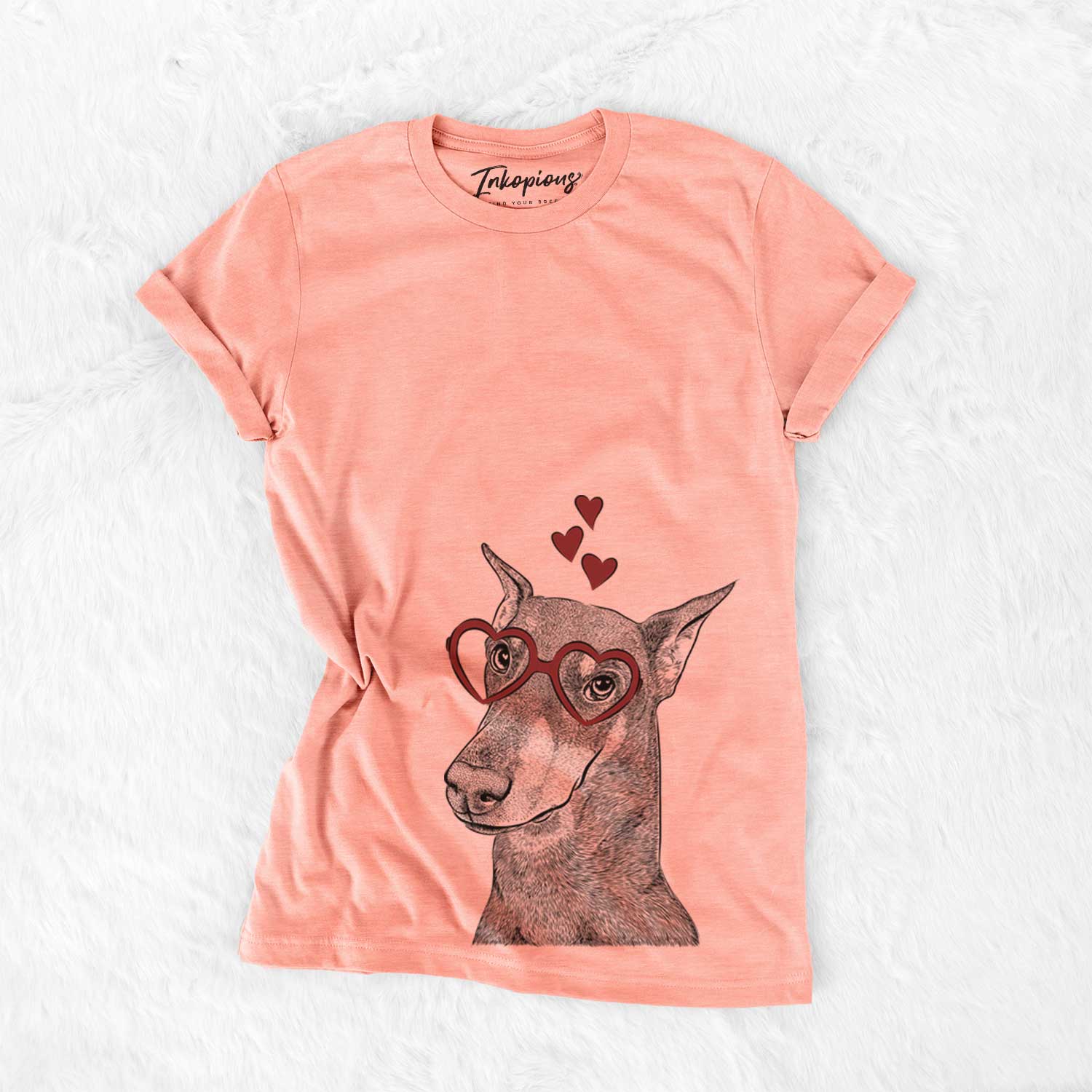 Hand-drawn sketch of Shelby the Doberman Pinscher wearing heart-shaped glasses on a Sunset Bella Canvas Unisex Crewneck