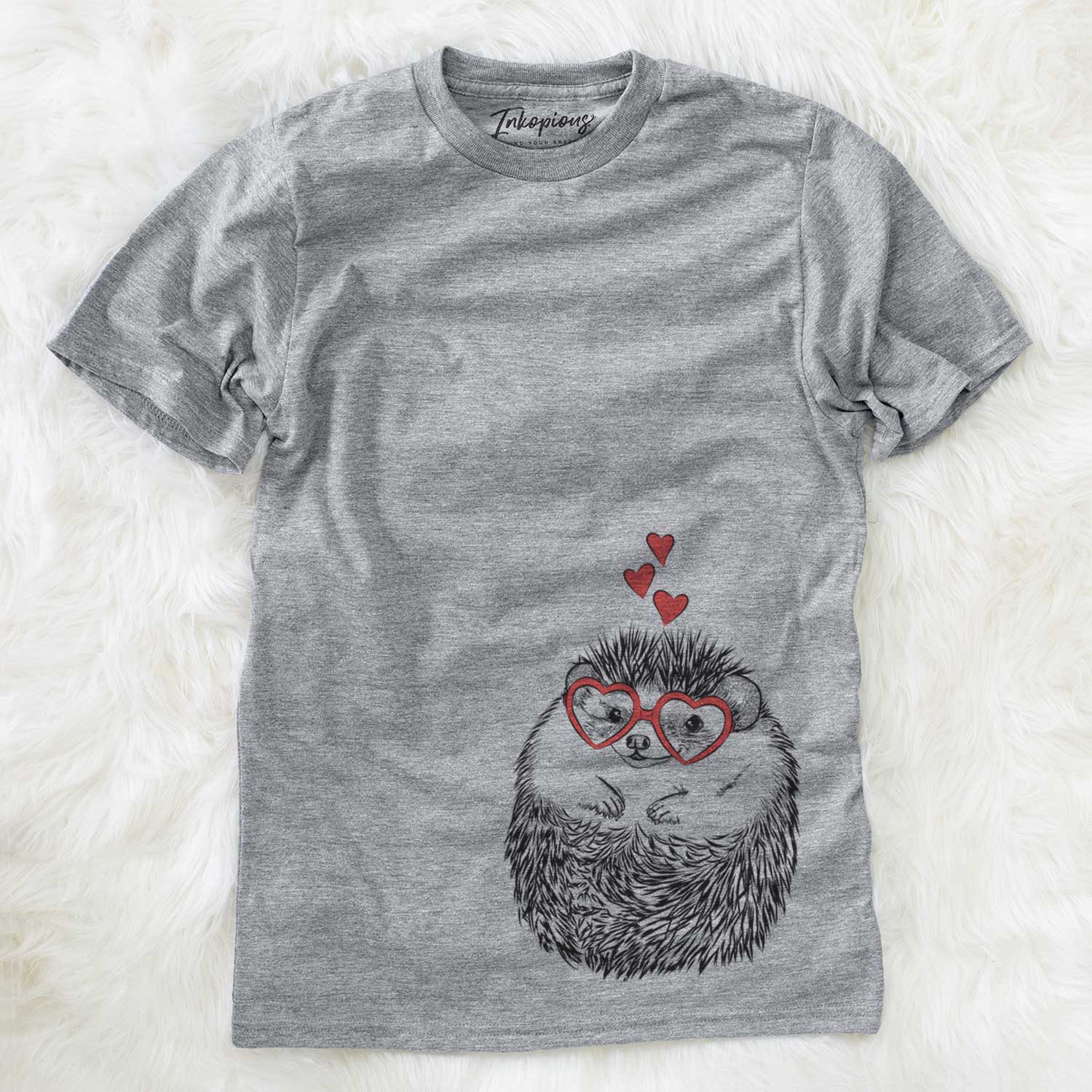 Hand-drawn sketch of Sid the Hedgehog wearing heart-shaped glasses on a Grey Unisex crewneck