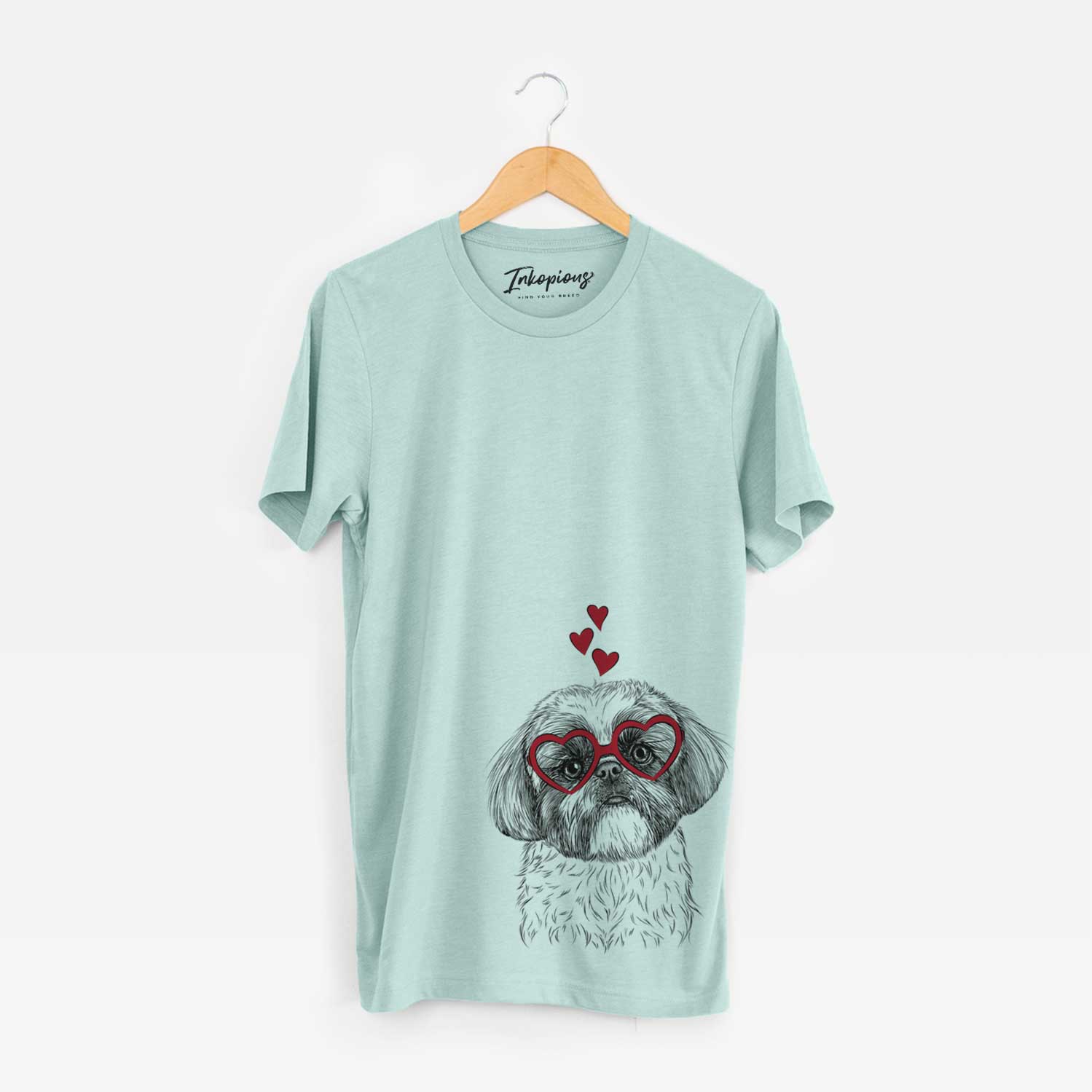 Hand-drawn sketch of Simon the Shih Tzu wearing heart-shaped glasses on a Heather Sage Bella Canvas Unisex Crewneck