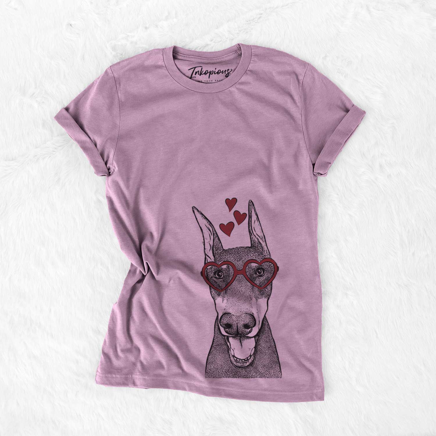 Hand-drawn sketch of Sir Duke the Doberman Pinscher wearing heart-shaped glasses on an Orchid Bella Canvas Unisex Crewneck