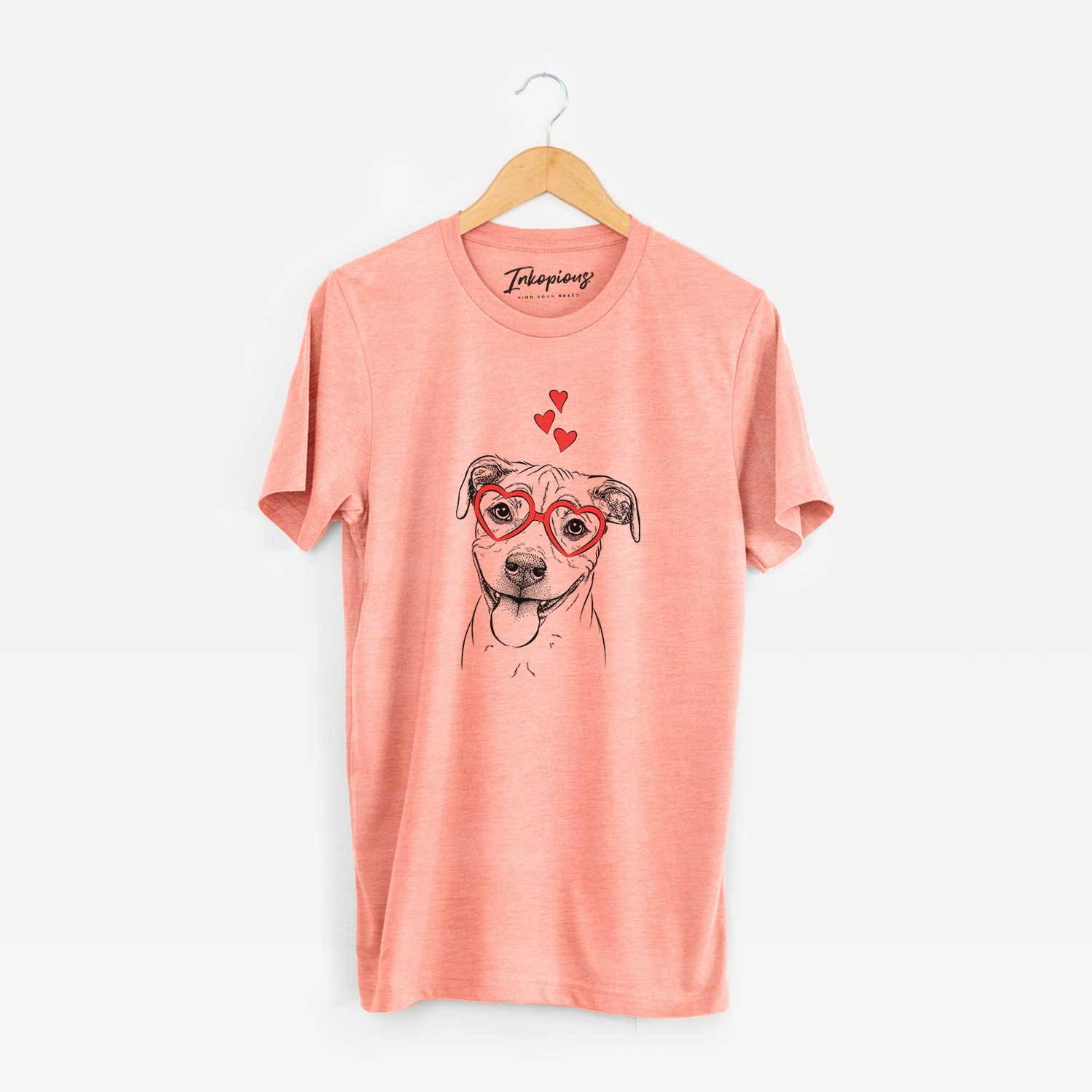 Hand-drawn sketch of Skye the Pitweiler wearing heart-shaped glasses on a Sunset Unisex crewneck