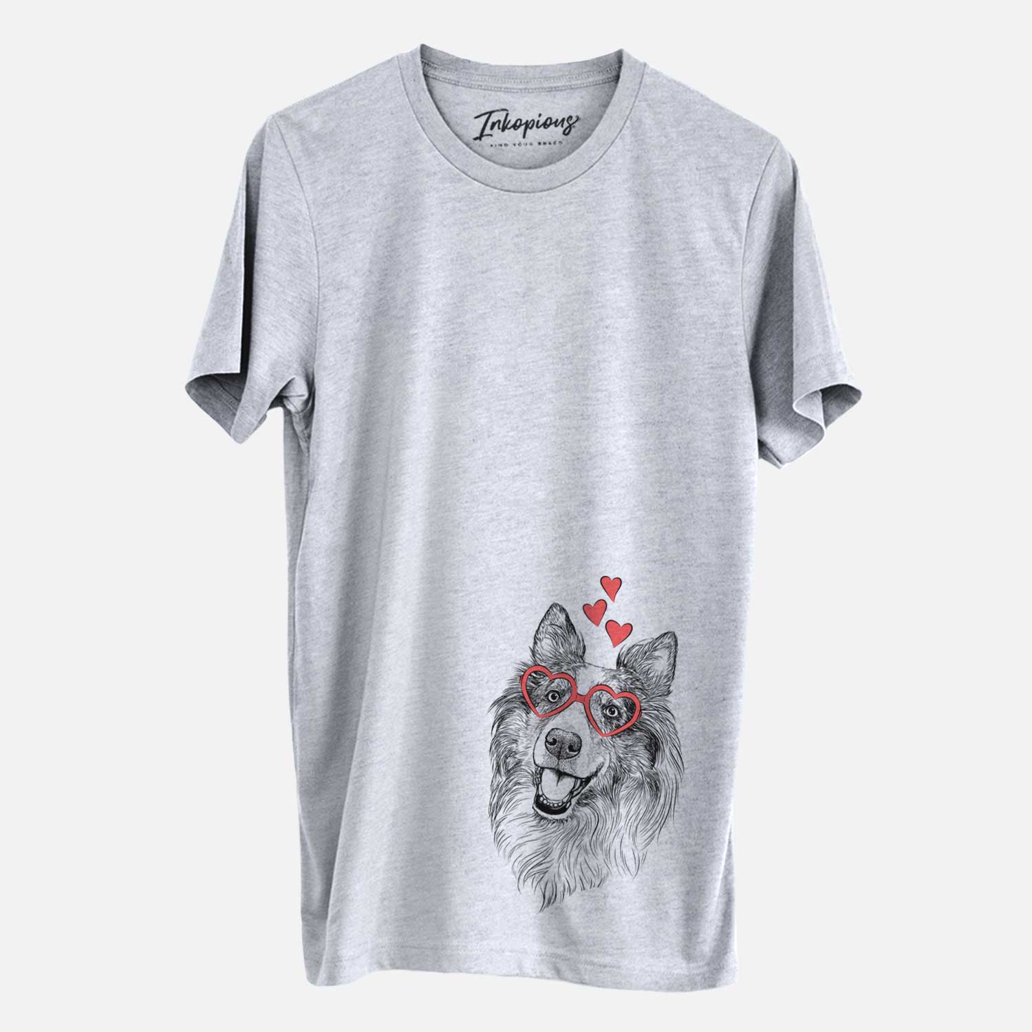 Hand-drawn sketch of Skylar the Shetland Sheepdog wearing heart-shaped glasses on a Grey Unisex crewneck