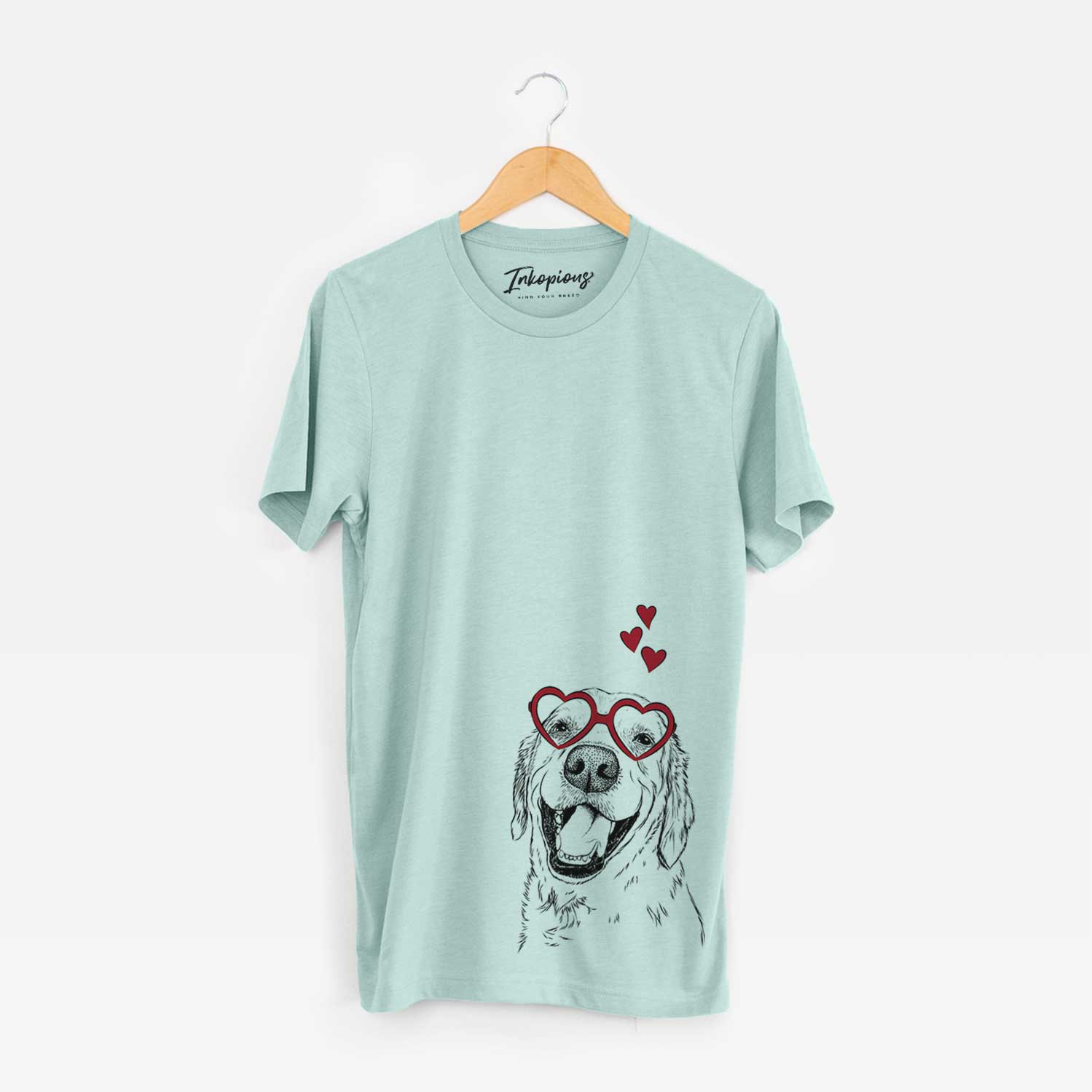 Hand-drawn sketch of Spanky the Golden Retriever wearing heart-shaped glasses on a Heather Sage Bella Canvas Unisex Crewneck