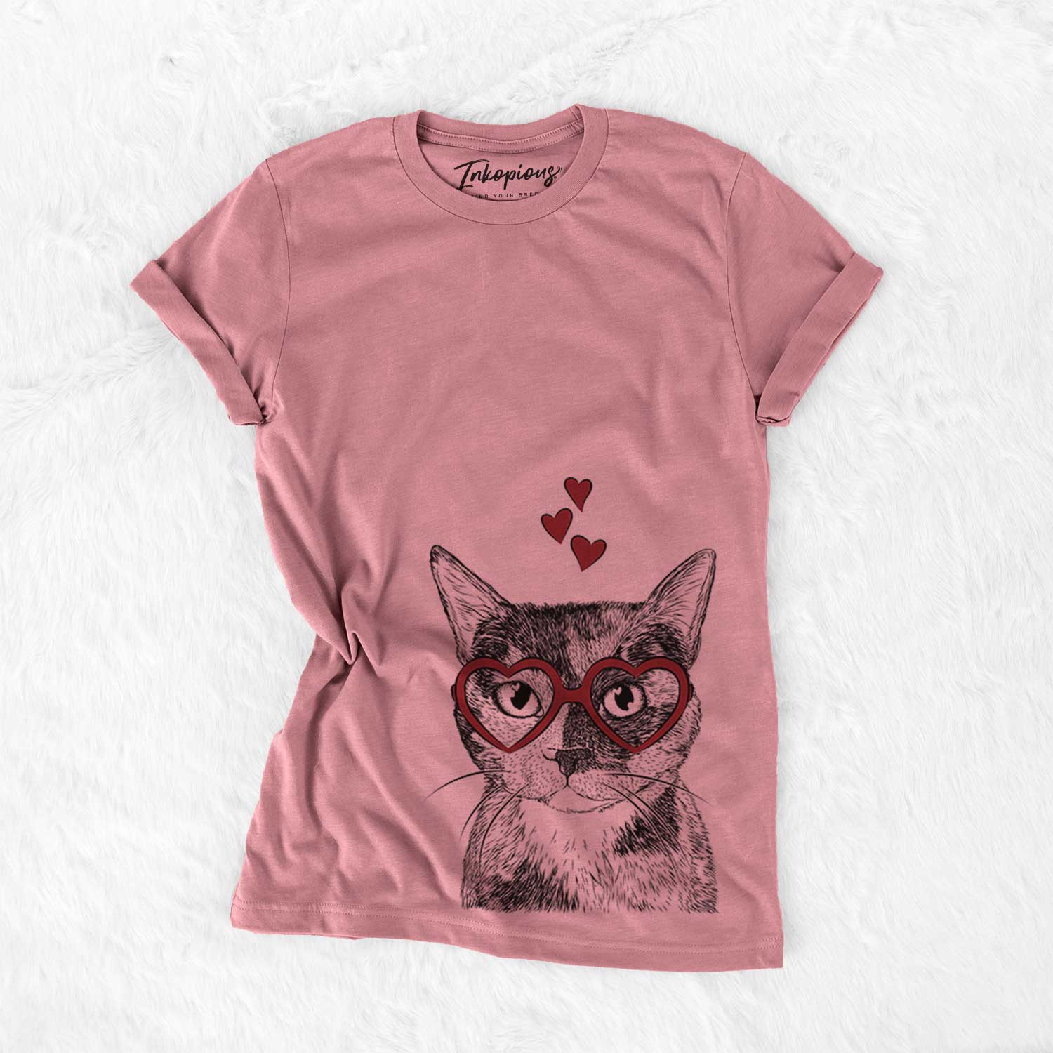 Hand-drawn sketch of Spooky Kitty the Tortoiseshell Cat wearing heart-shaped glasses on a Mauve Bella Canvas Unisex Crewneck