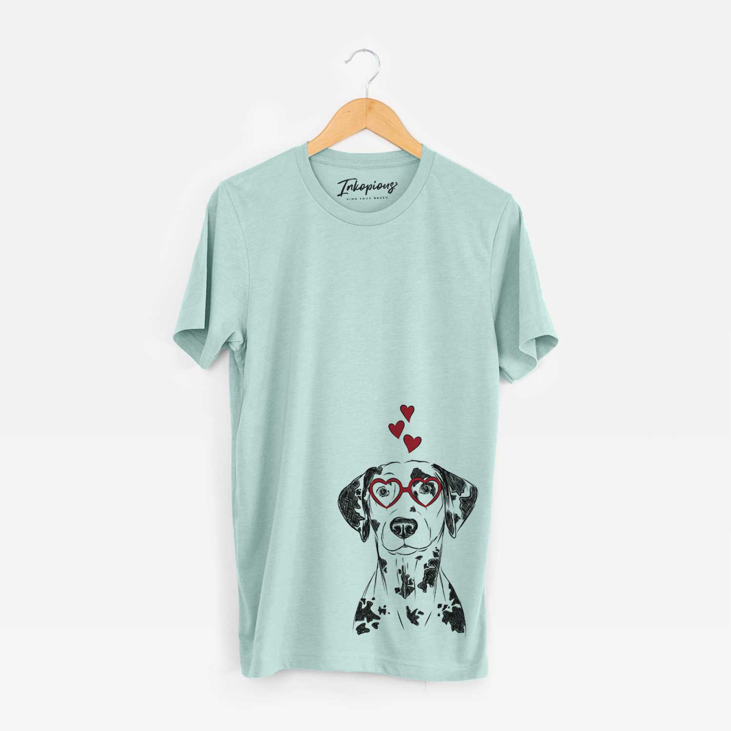 Hand-drawn sketch of Spot the Dalmatian wearing heart-shaped glasses on a Heather Sage Bella Canvas Unisex Crewneck