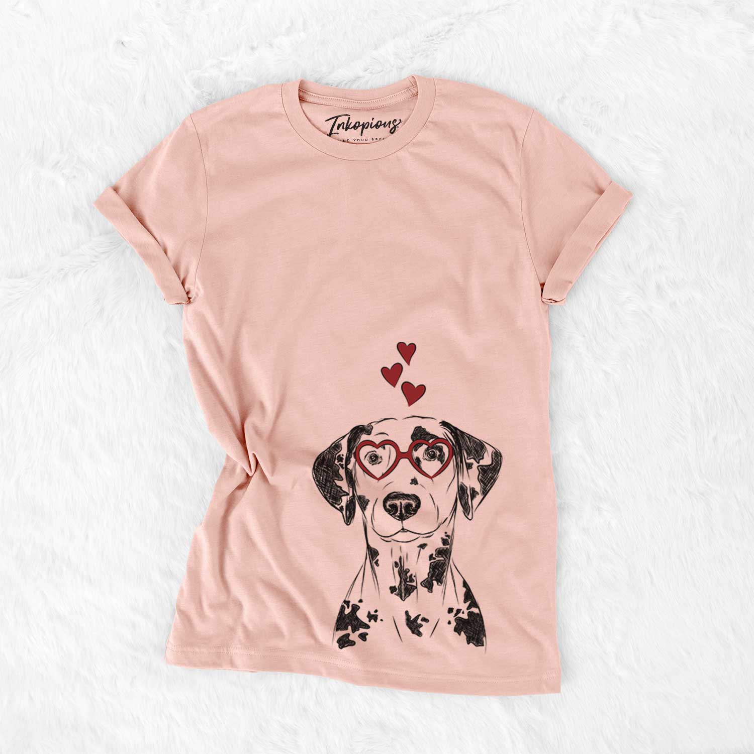 Hand-drawn sketch of Spot the Dalmatian wearing heart-shaped glasses on a Peach Bella Canvas Unisex Crewneck