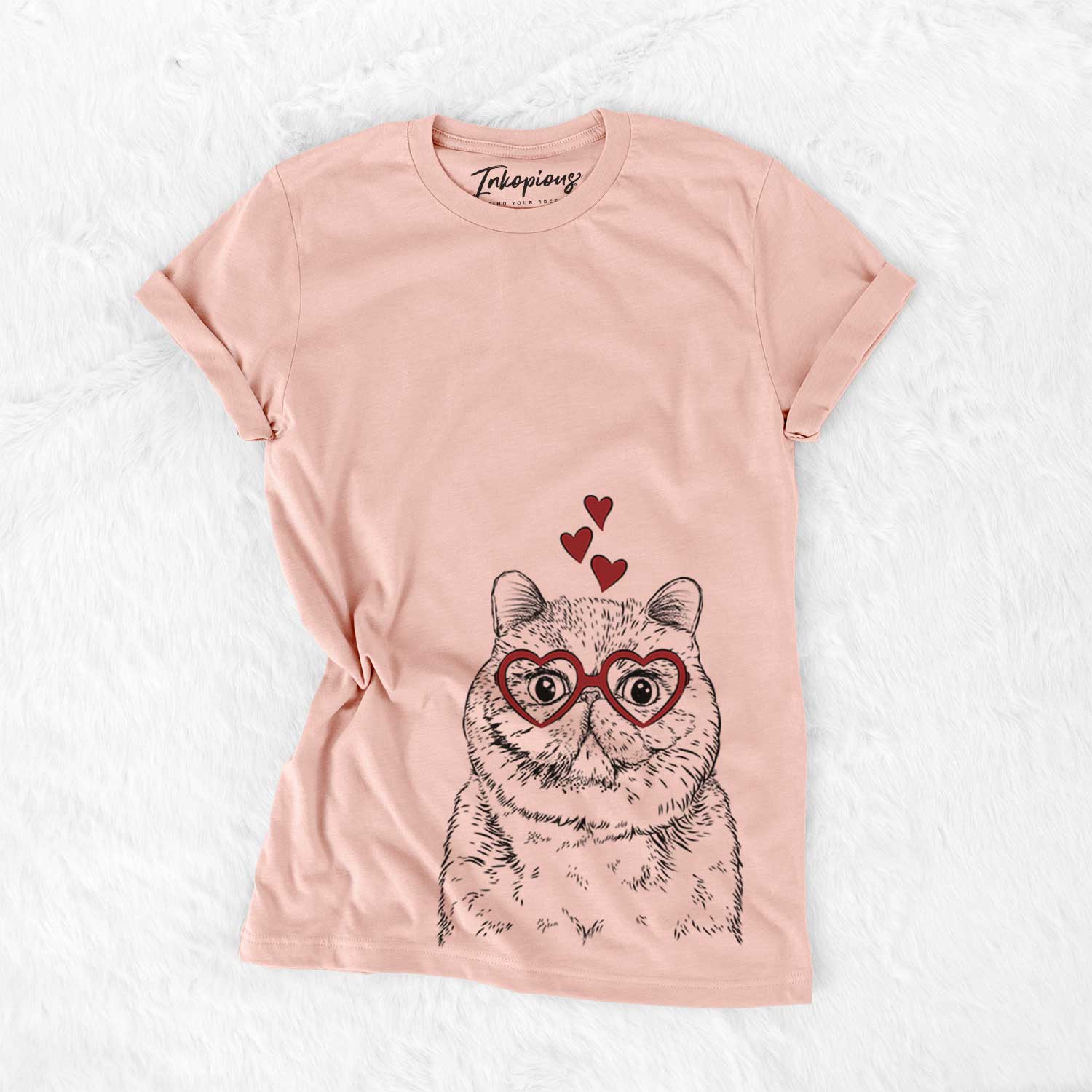 Hand-drawn sketch of Squish the Exotic Shorthair Cat wearing heart-shaped glasses on a Peach Bella Canvas Unisex Crewneck