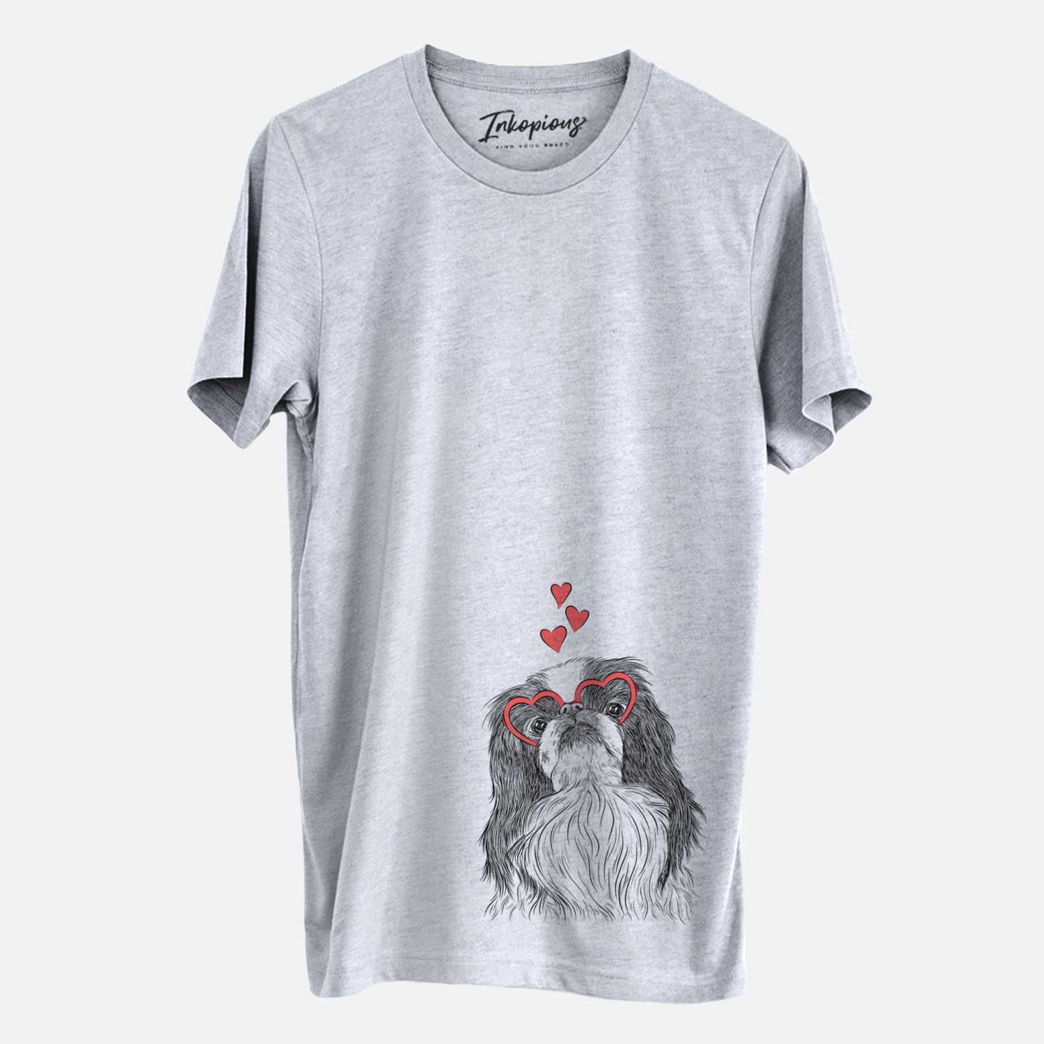 Hand-drawn sketch of Suki the Japanese Chin wearing heart-shaped glasses on a Grey Unisex crewneck