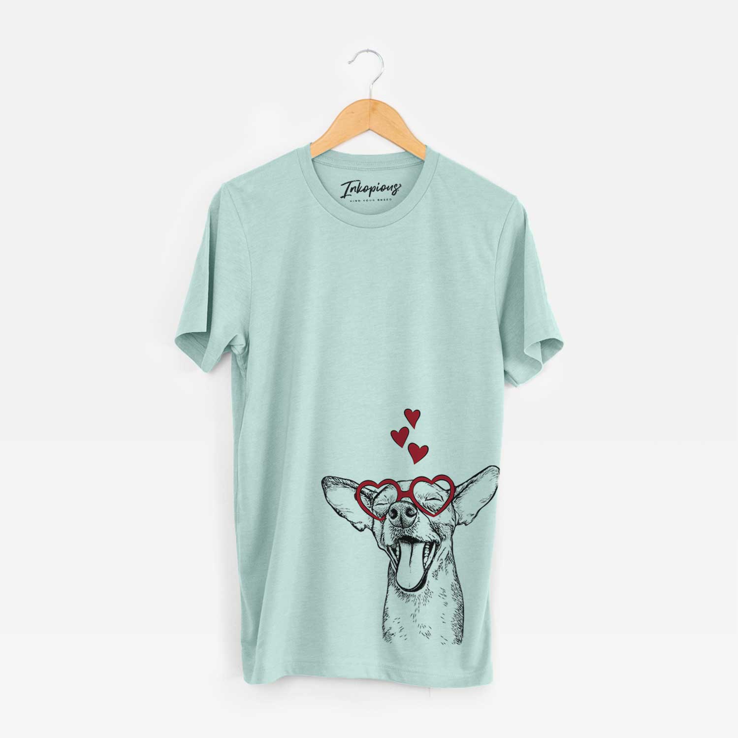 Hand-drawn sketch of Sweet Bailey the Chihuahua Mix wearing heart-shaped glasses on a Heather Sage Bella Canvas Unisex Crewneck