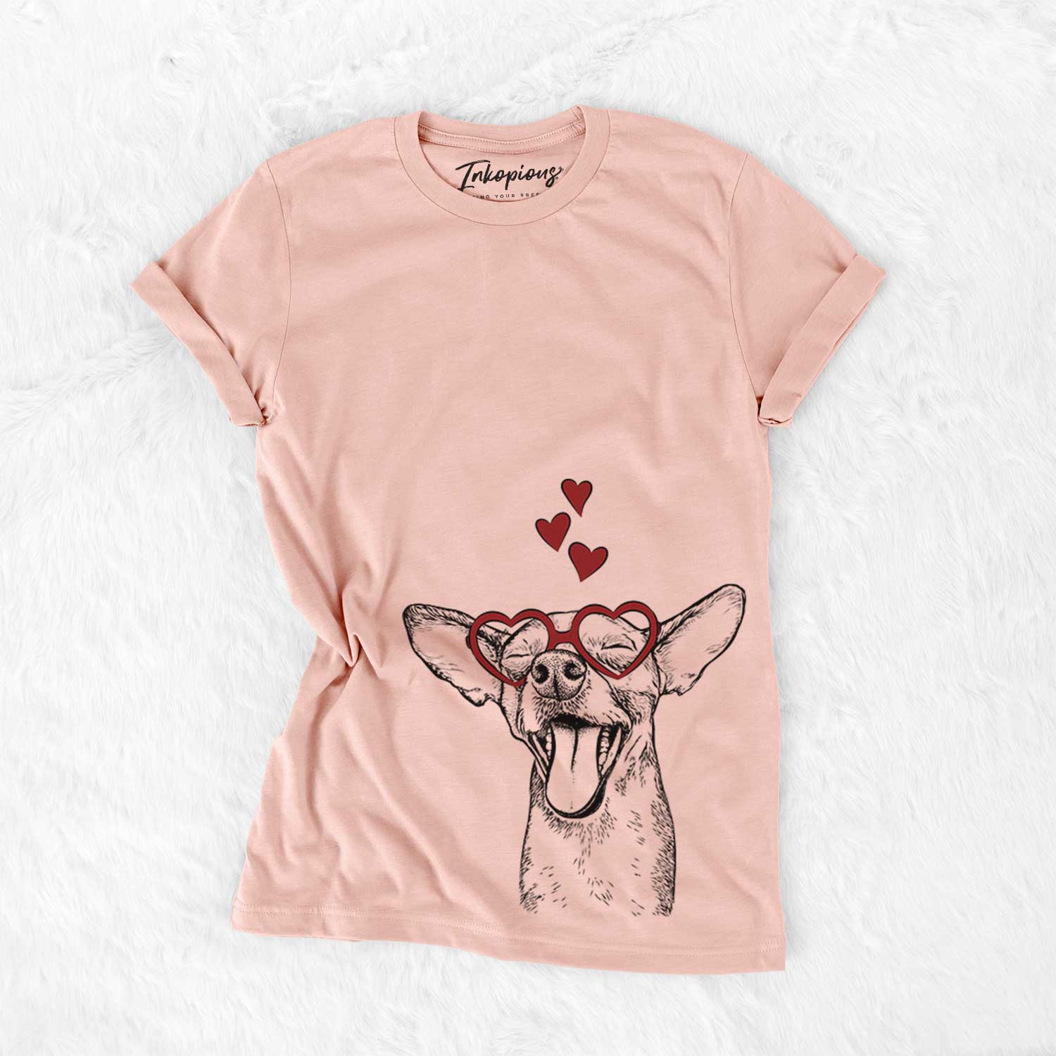 Hand-drawn sketch of Sweet Bailey the Chihuahua Mix wearing heart-shaped glasses on a Peach Bella Canvas Unisex Crewneck