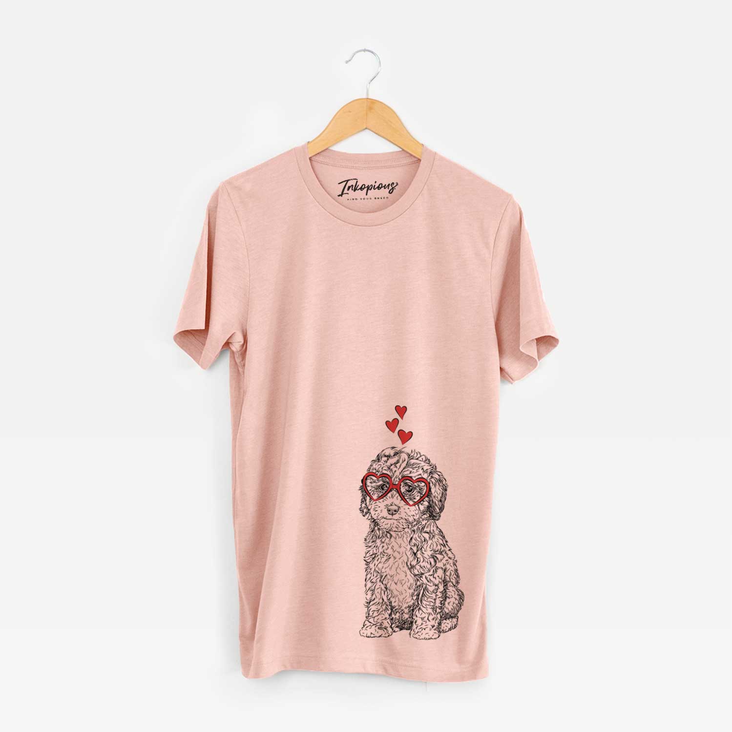 Hand-drawn sketch of Sweet Tea the Mini Doodle wearing heart-shaped glasses on a Peach Unisex crewneck
