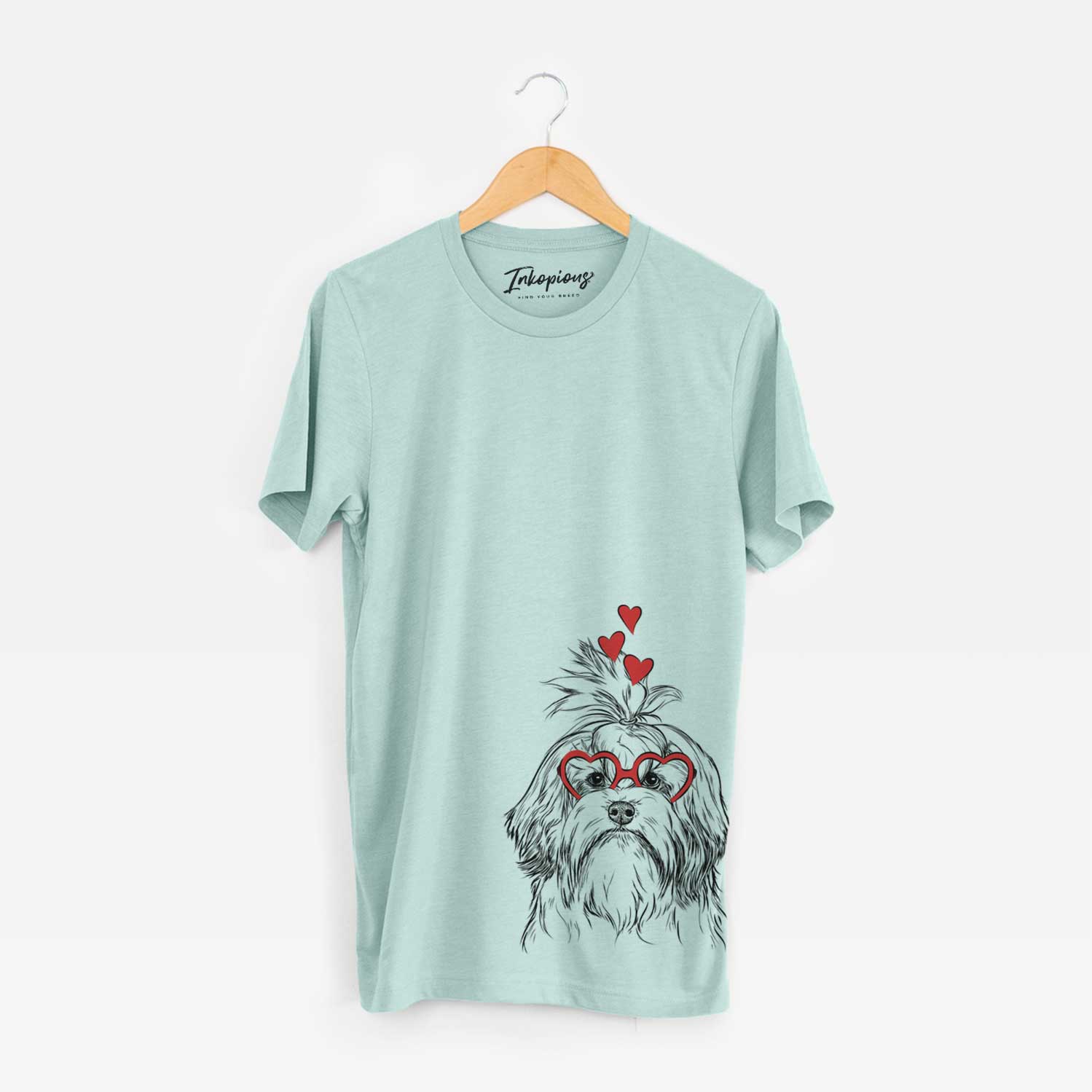 Hand-drawn sketch of Tootsie the Lowchen wearing heart-shaped glasses on a Heather Sage Unisex crewneck