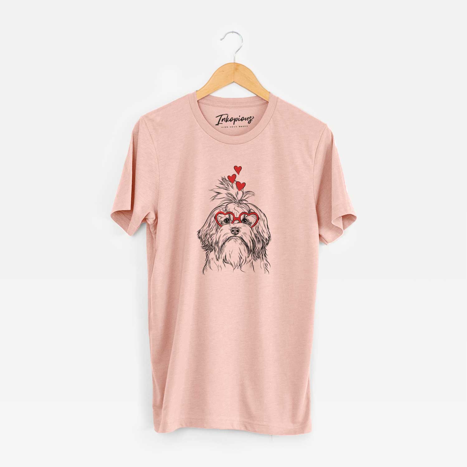 Hand-drawn sketch of Tootsie the Lowchen wearing heart-shaped glasses on a Peach Unisex crewneck