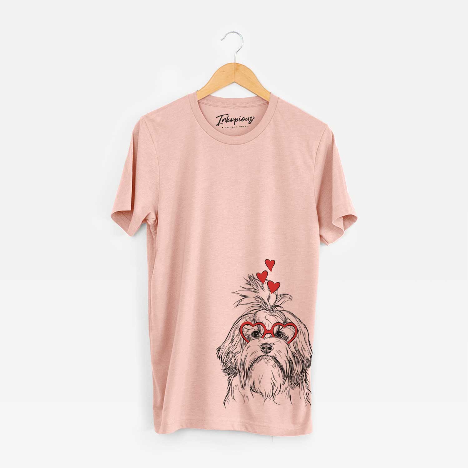 Hand-drawn sketch of Tootsie the Lowchen wearing heart-shaped glasses on a Peach Unisex crewneck