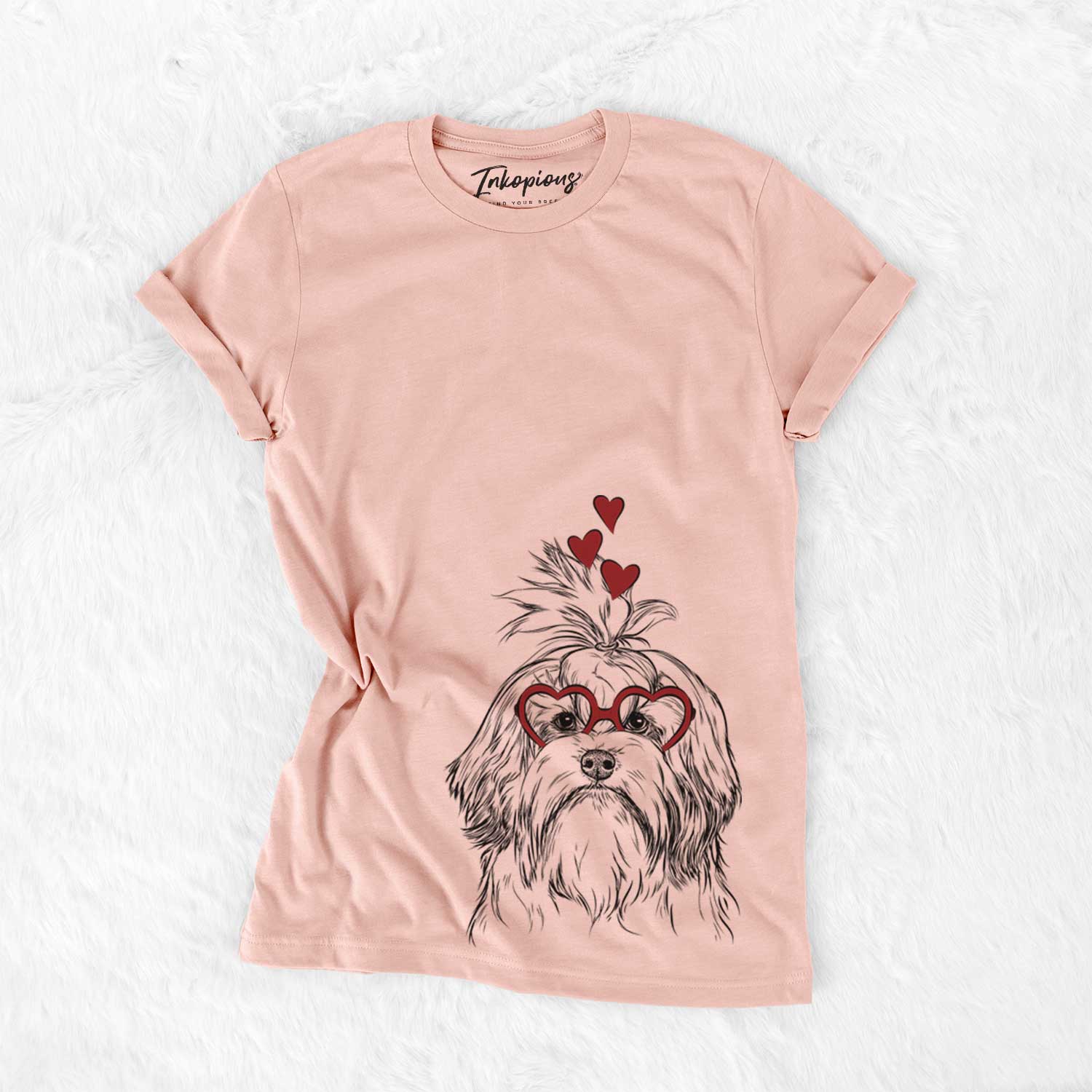 Hand-drawn sketch of Tootsie the Lowchen wearing heart-shaped glasses on a Peach Bella Canvas Unisex Crewneck