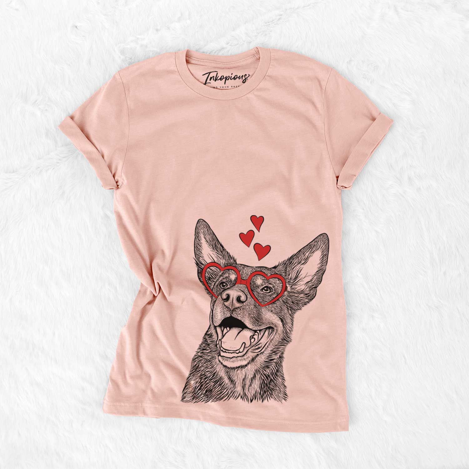 Hand-drawn sketch of Tucker the Australian Kelpie wearing heart-shaped glasses on a Peach Bella Canvas Unisex Crewneck