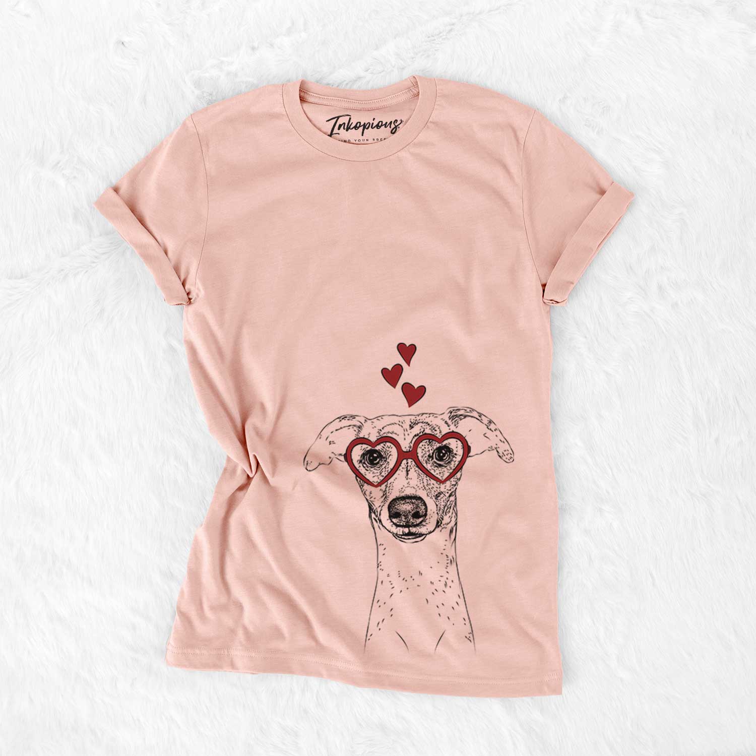 Hand-drawn sketch of Twiggy the Whippet wearing heart-shaped glasses on a Peach Bella Canvas Unisex Crewneck