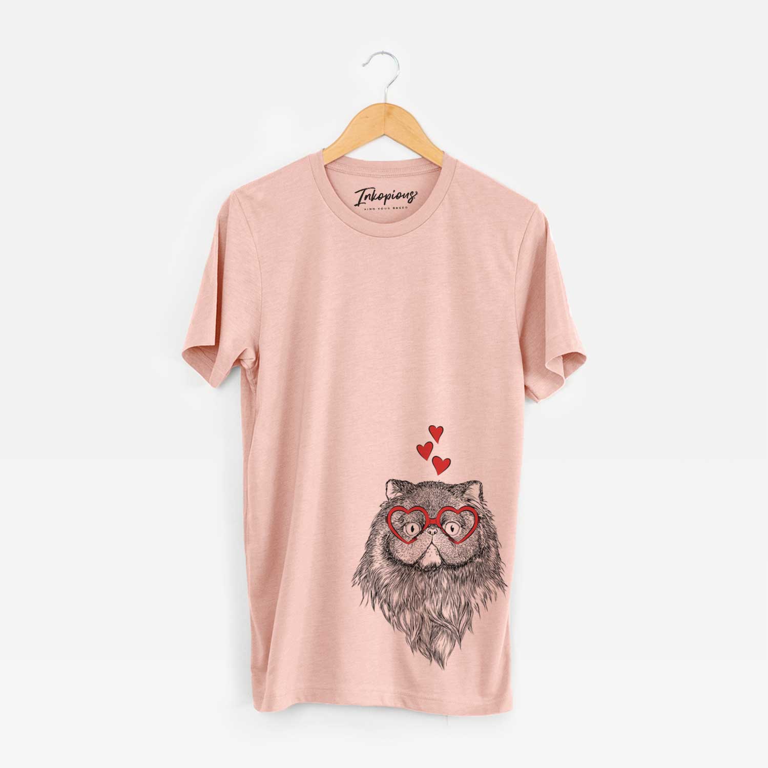 Hand-drawn sketch of Vader the Persian Cat wearing heart-shaped glasses on a Peach Unisex crewneck