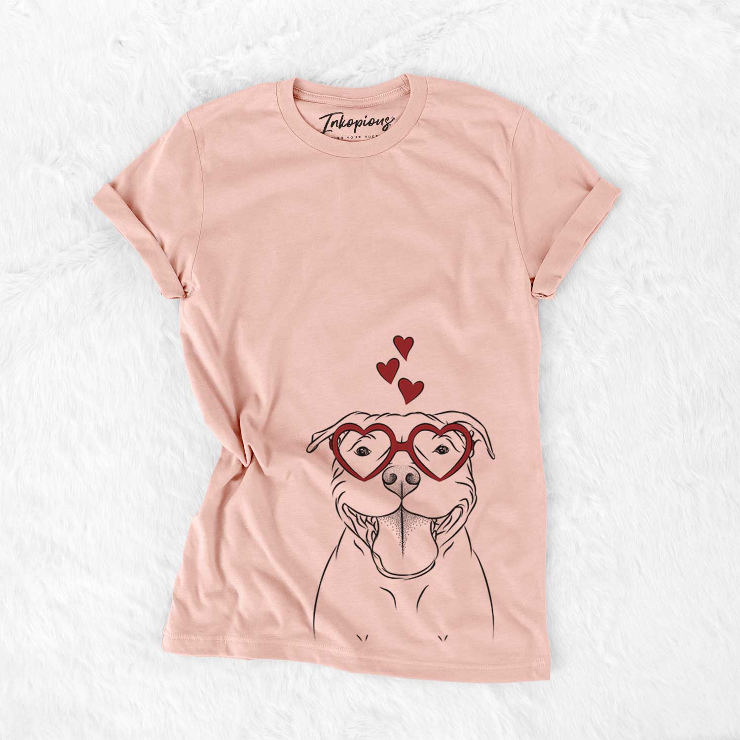 Hand-drawn sketch of Wafer the Staffordshire Bull Terrier wearing heart-shaped glasses on a Peach Bella Canvas Unisex Crewneck