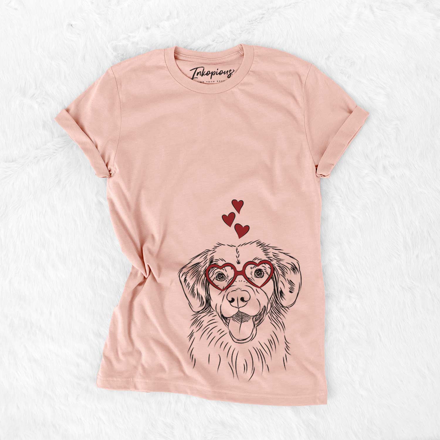 Hand-drawn sketch of Weston the Nova Scotia Duck Tolling Retriever wearing heart-shaped glasses on a Peach Bella Canvas Unisex Crewneck
