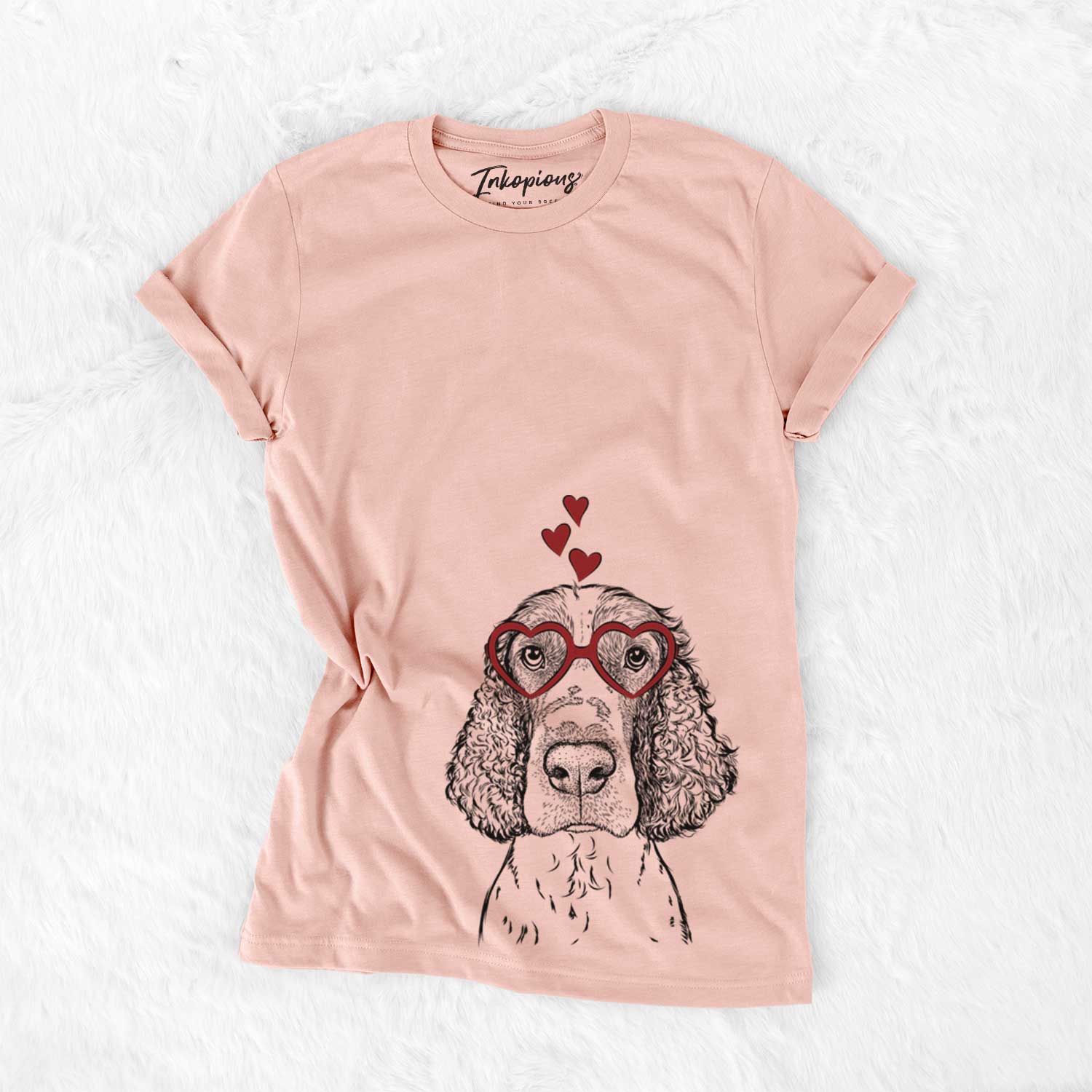Hand-drawn sketch of Wilbur the English Springer Spaniel wearing heart-shaped glasses on a Peach Bella Canvas Unisex Crewneck